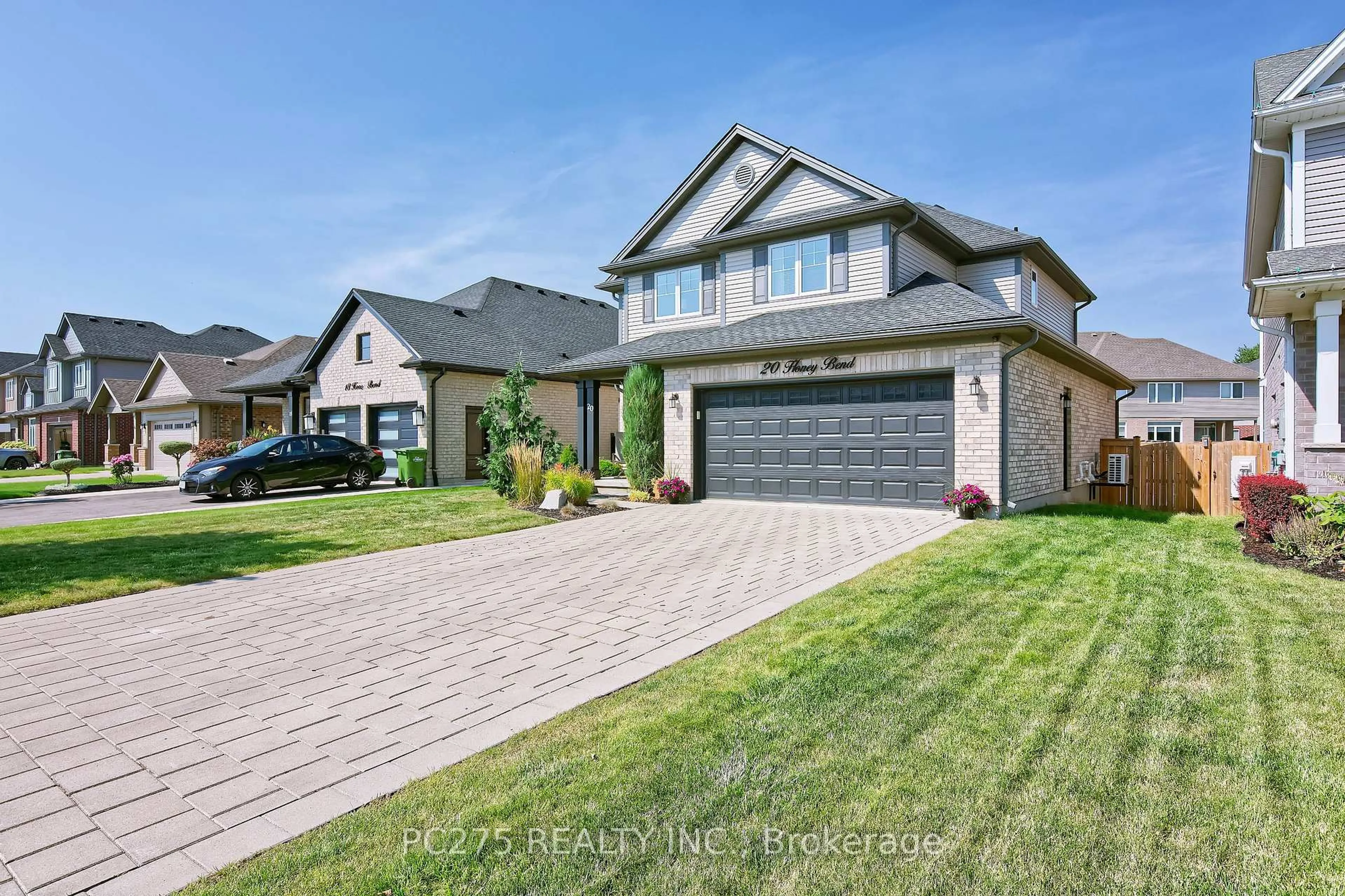 Home with brick exterior material, street for 20 Honey Bend, St. Thomas Ontario N5P 3S6
