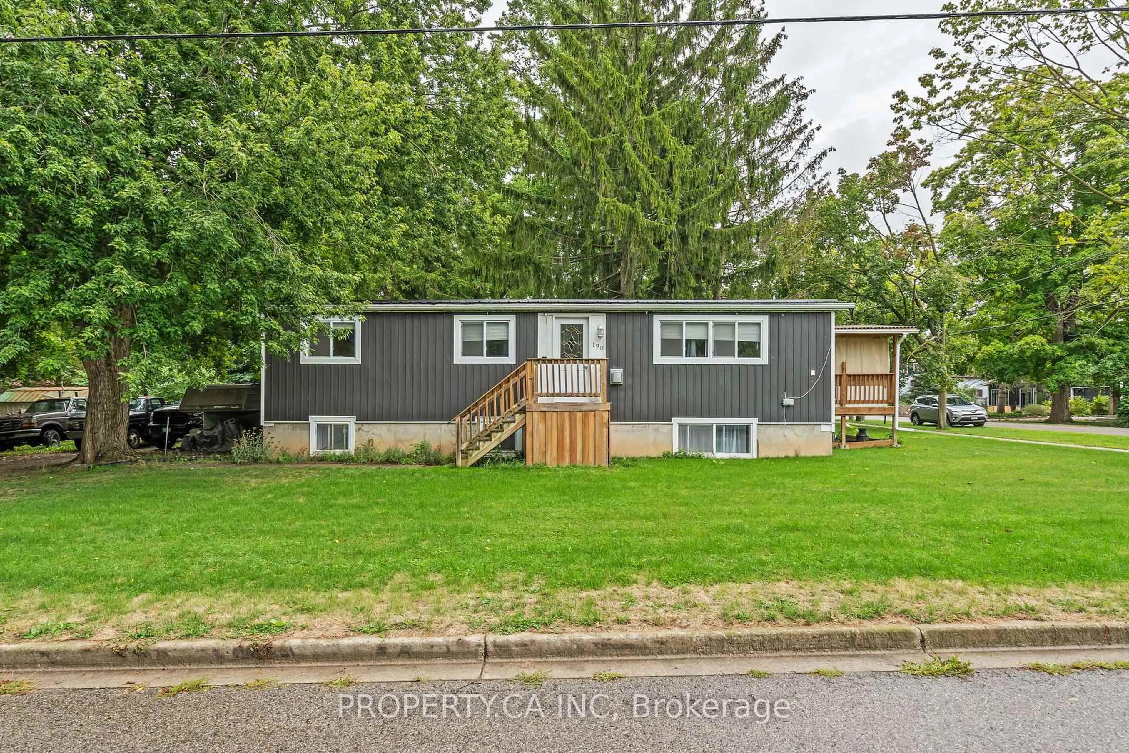 Home with vinyl exterior material, street for 190 Ann St, North Middlesex Ontario N0M 2K0