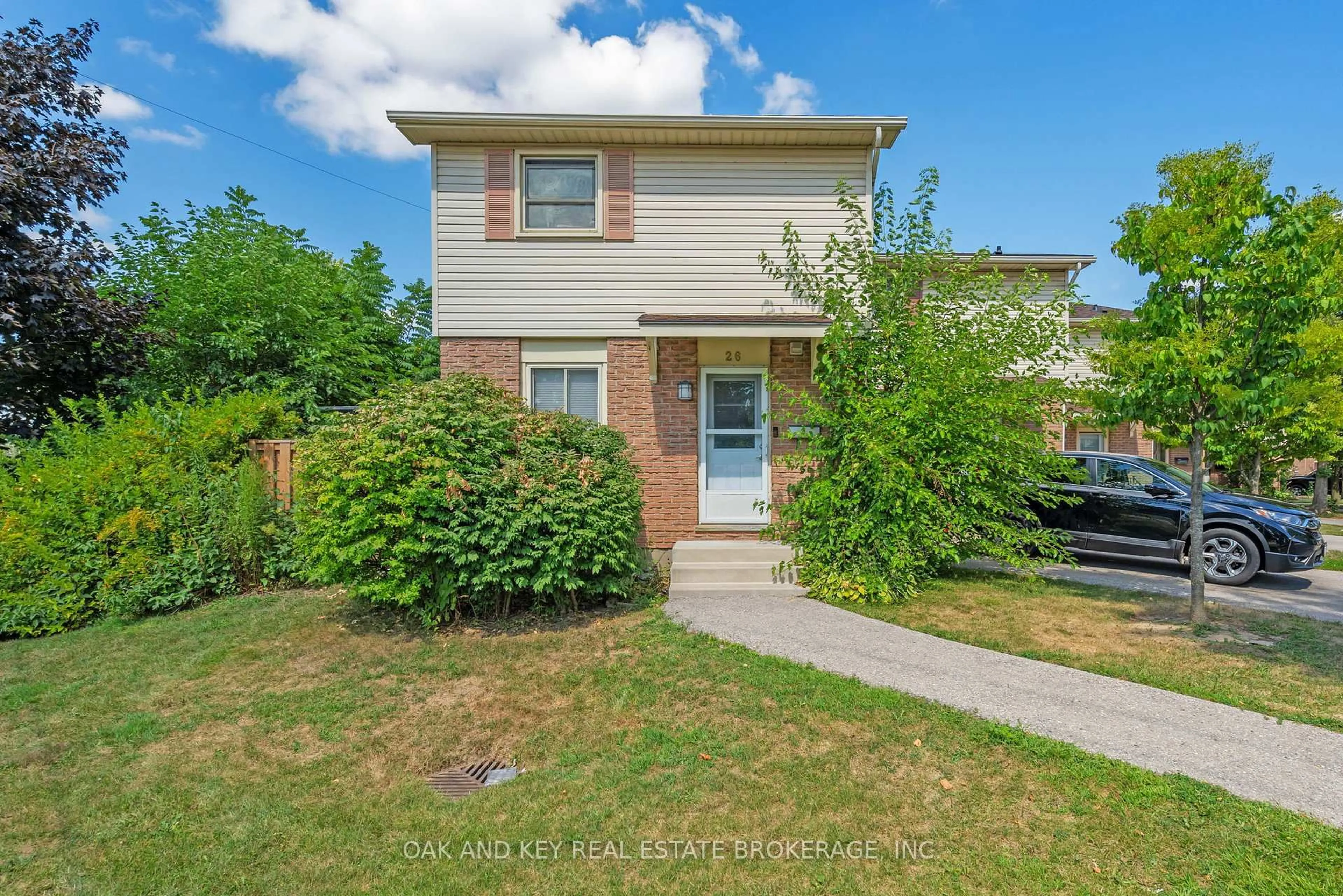 A pic from outside/outdoor area/front of a property/back of a property/a pic from drone, street for 230 Clarke Rd #26, London East Ontario N5W 5P5