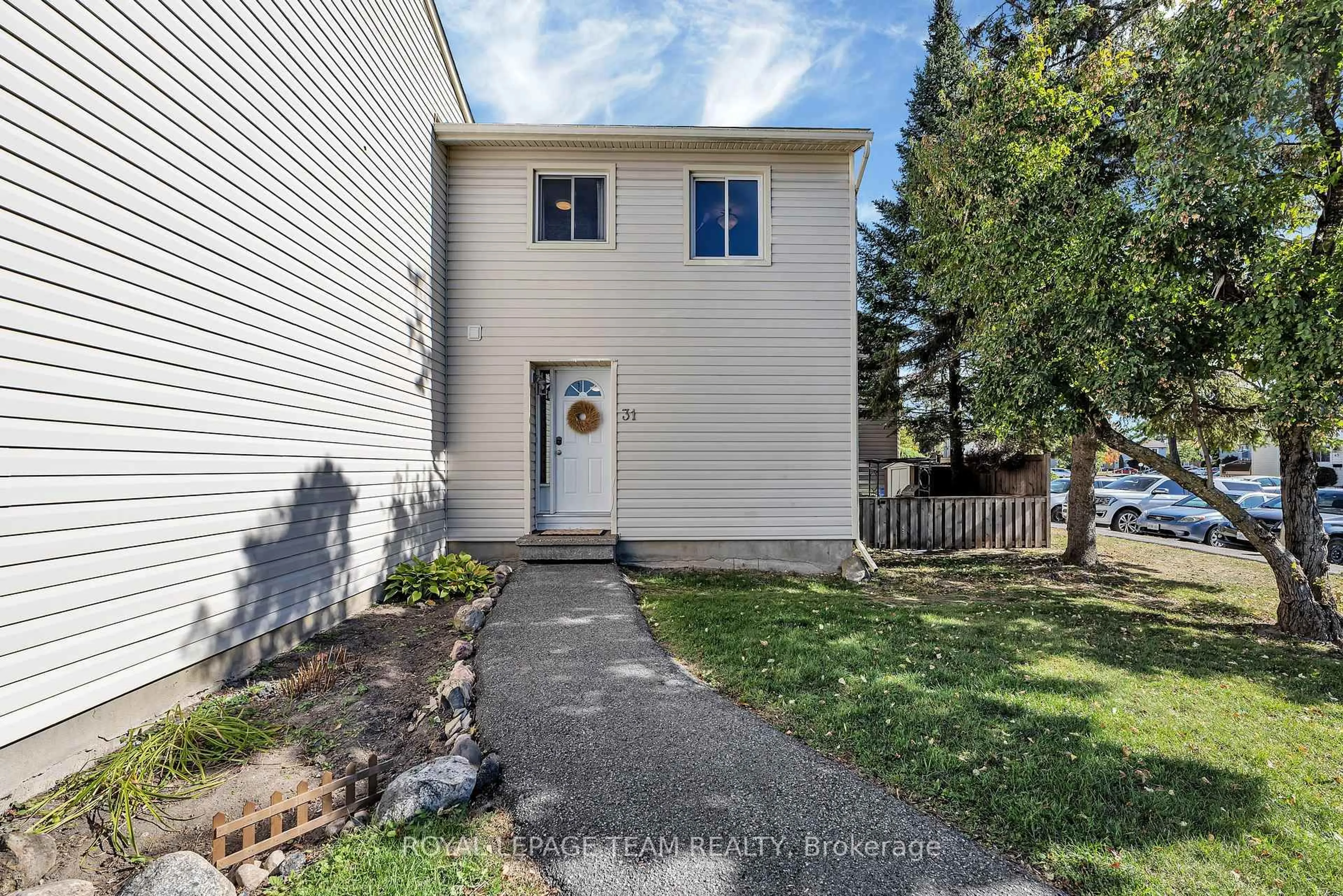 A pic from outside/outdoor area/front of a property/back of a property/a pic from drone, street for 31 Malvern Dr #10, Ottawa Ontario K2J 1M8