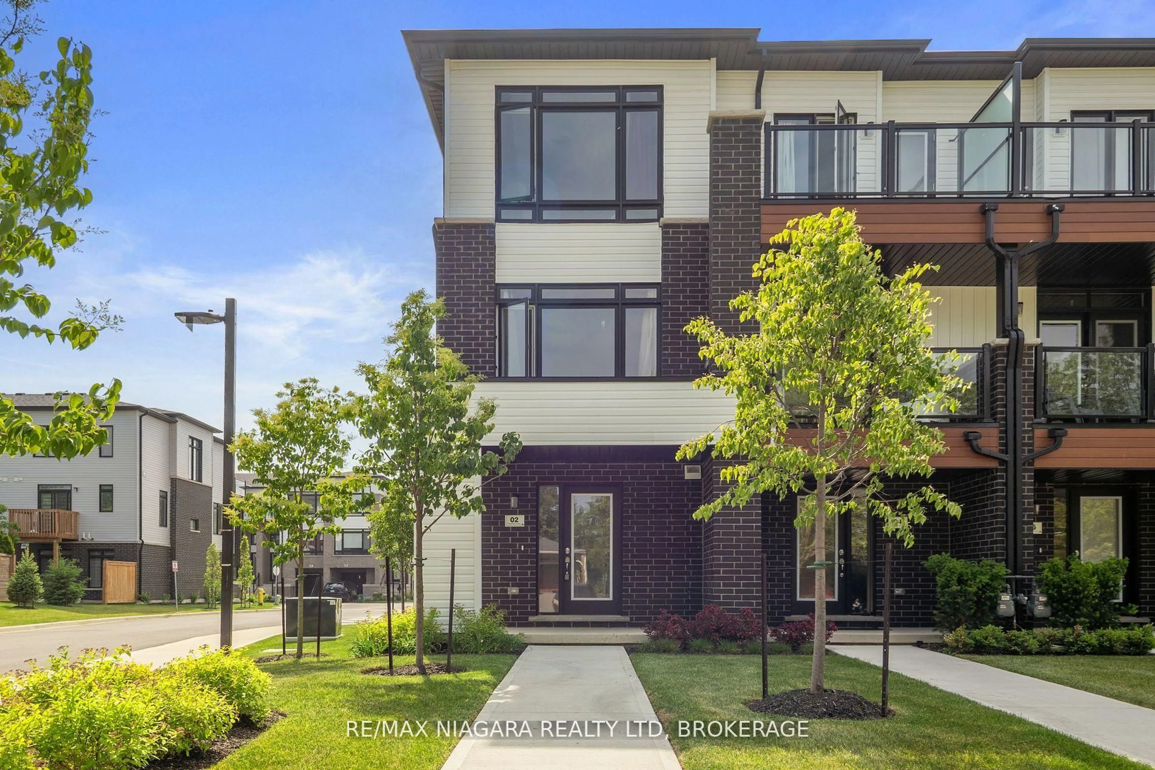 Home with brick exterior material, street for 2 Sidney Rose Common, St. Catharines Ontario L2T 0B3