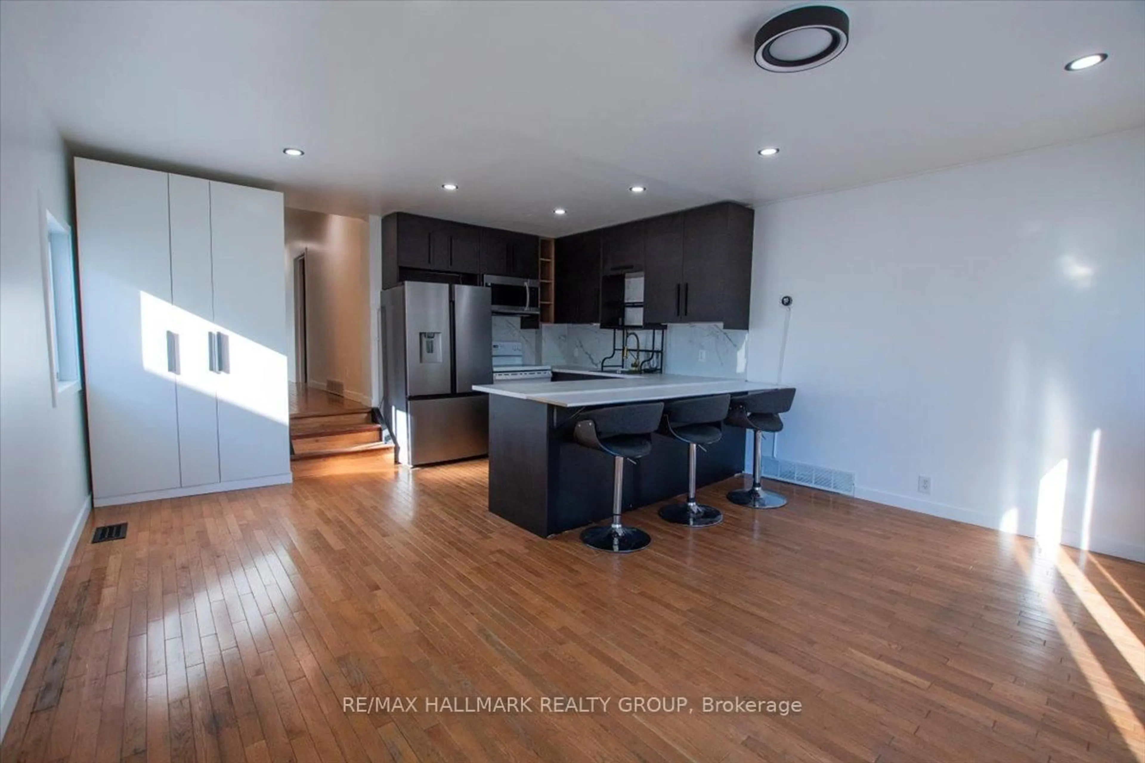 Open concept kitchen, wood/laminate floor for 367 Princess St, North Bay Ontario P1B 6C7