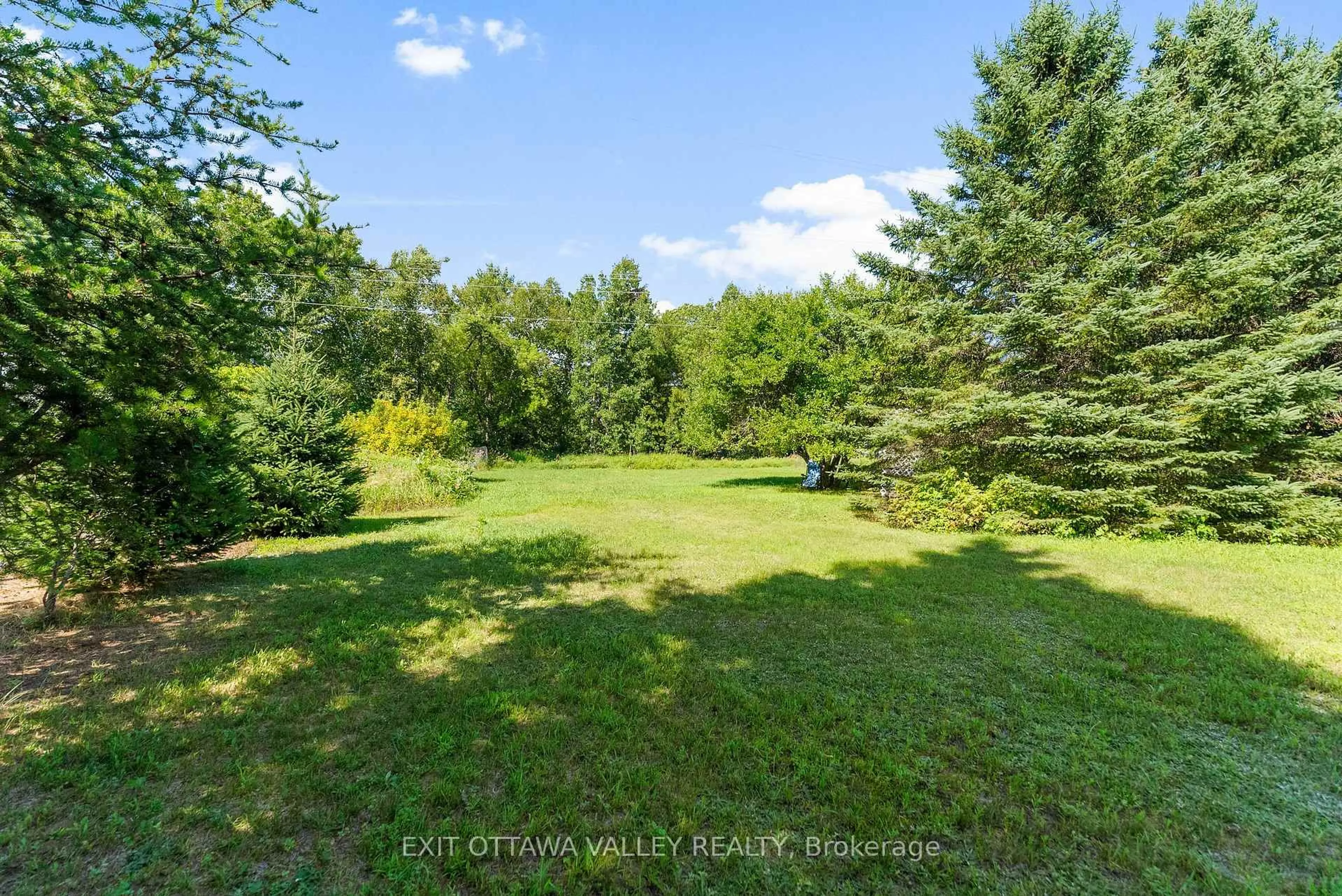 A pic from outside/outdoor area/front of a property/back of a property/a pic from drone, forest/trees view for 15 Philip St, Barry's Bay Ontario K0J 1B0