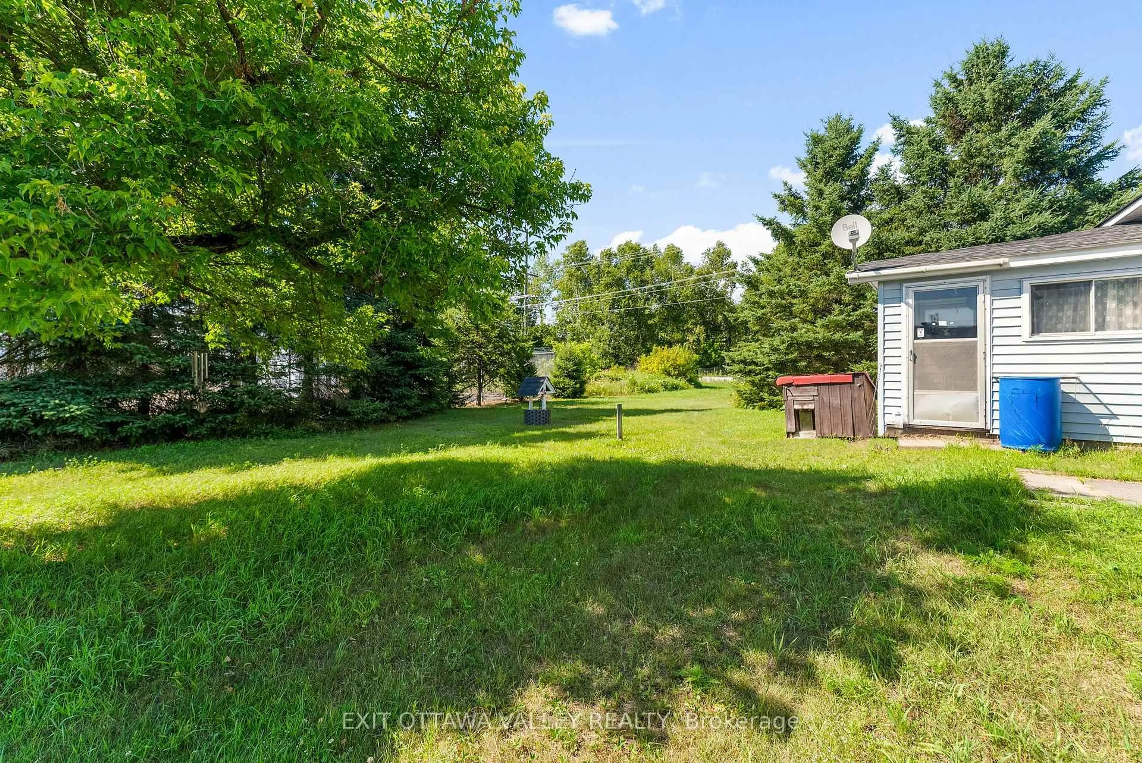 A pic from outside/outdoor area/front of a property/back of a property/a pic from drone, water/lake/river/ocean view for 15 Philip St, Barry's Bay Ontario K0J 1B0