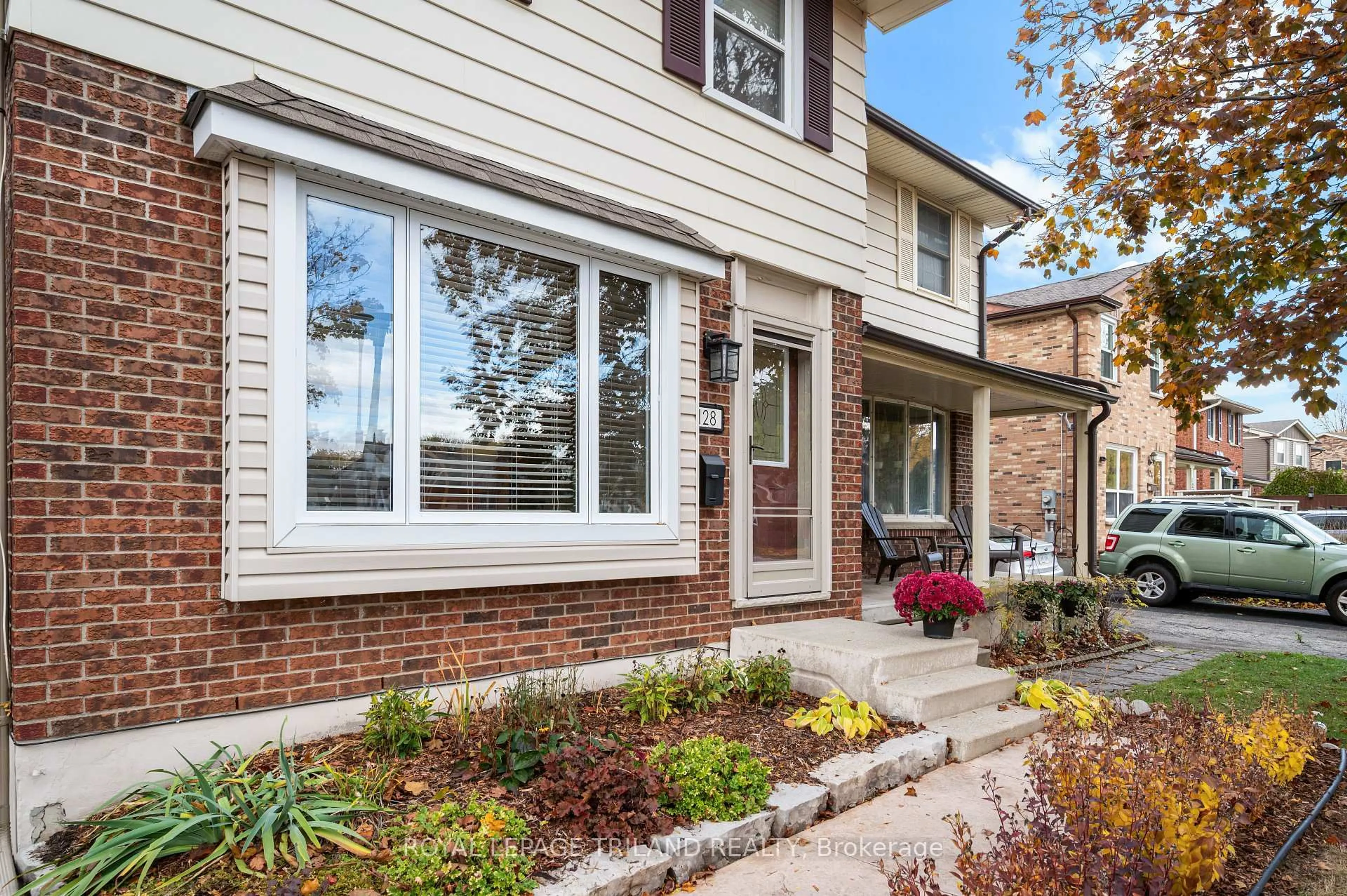 Home with brick exterior material, street for 128 Garland Lane, London East Ontario N5V 3K8