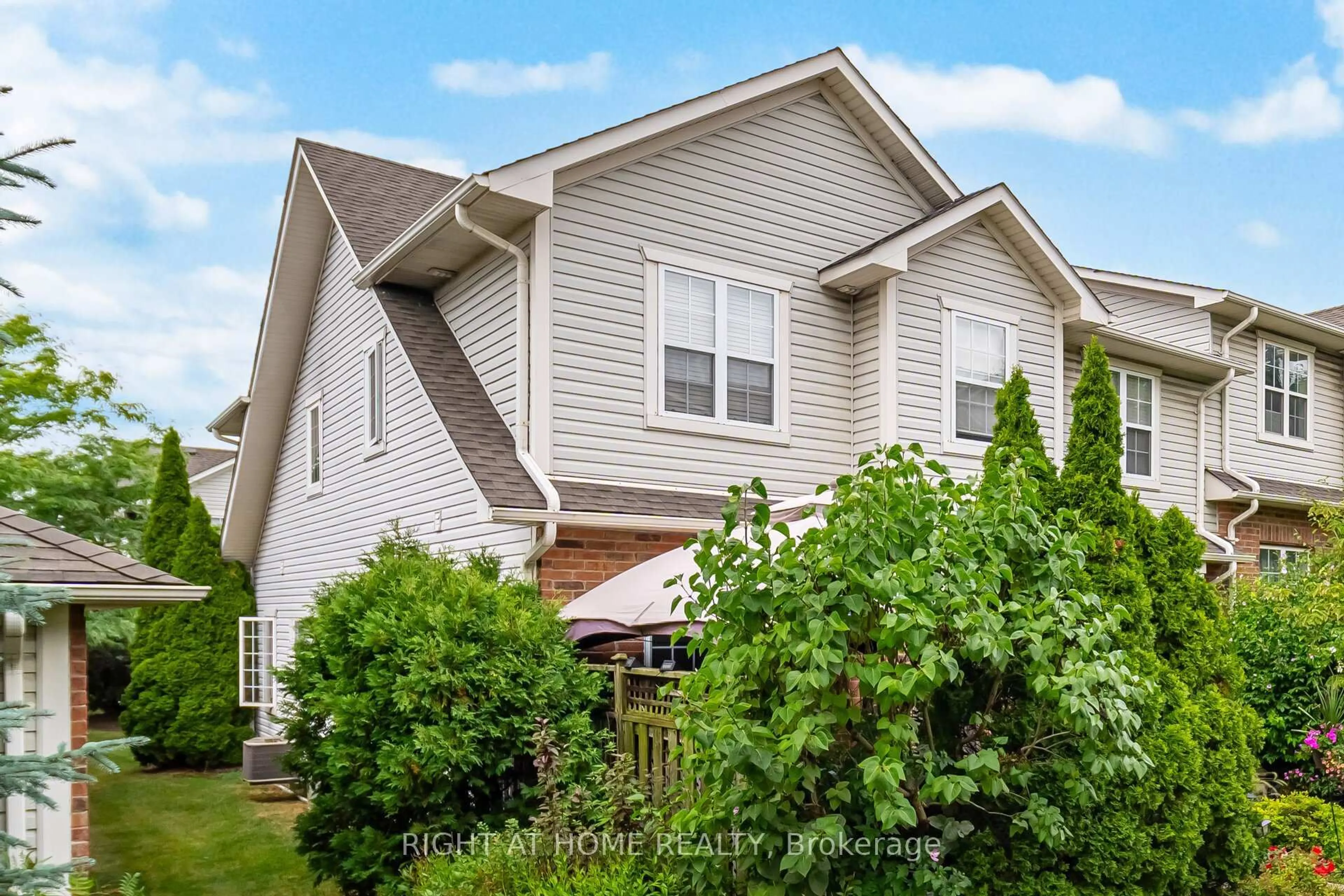 Home with vinyl exterior material, street for 1085 Harrogate Dr #35, Hamilton Ontario L9K 1R2