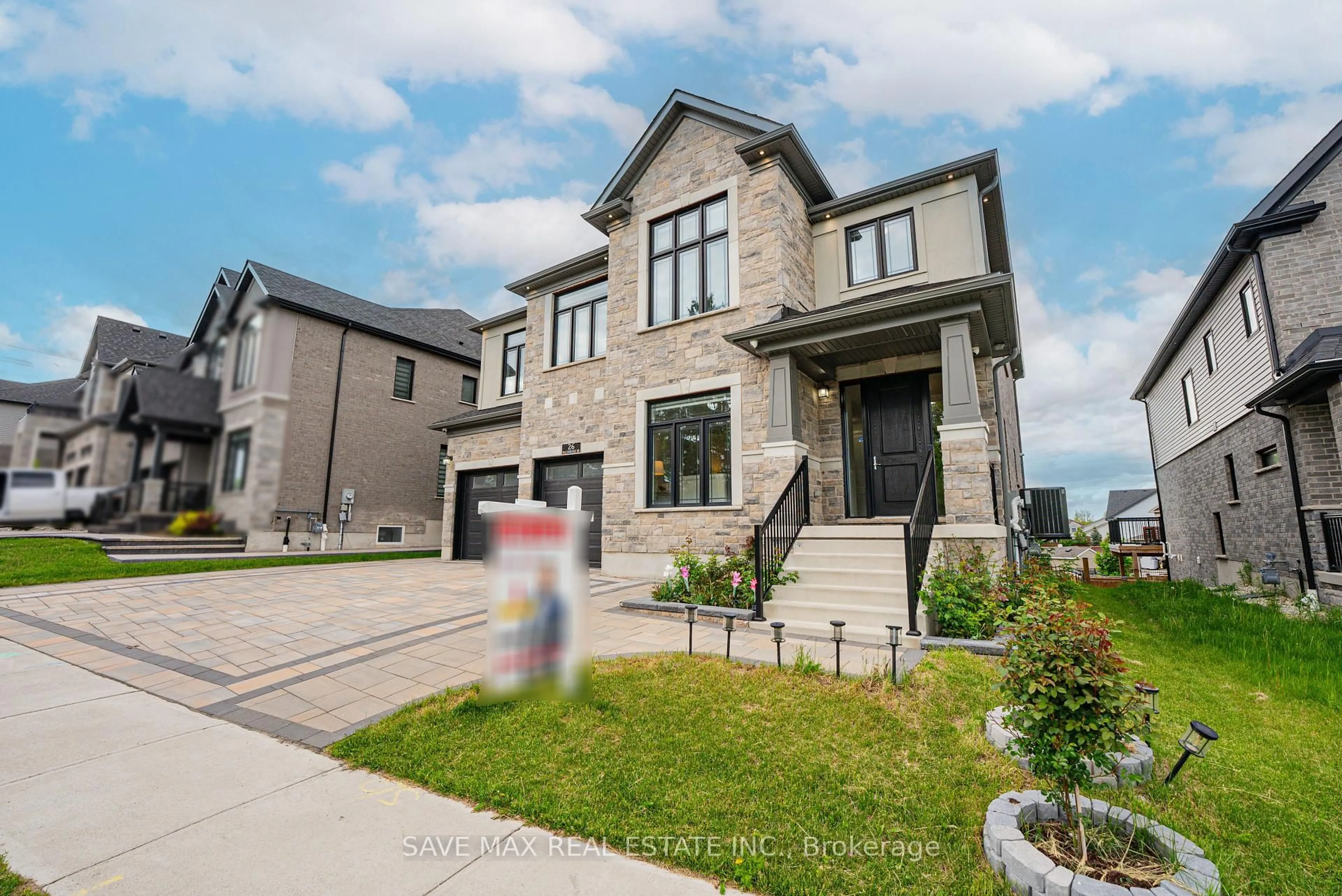 Home with brick exterior material, street for 26 Falconridge Dr, Kitchener Ontario N2K 0G1