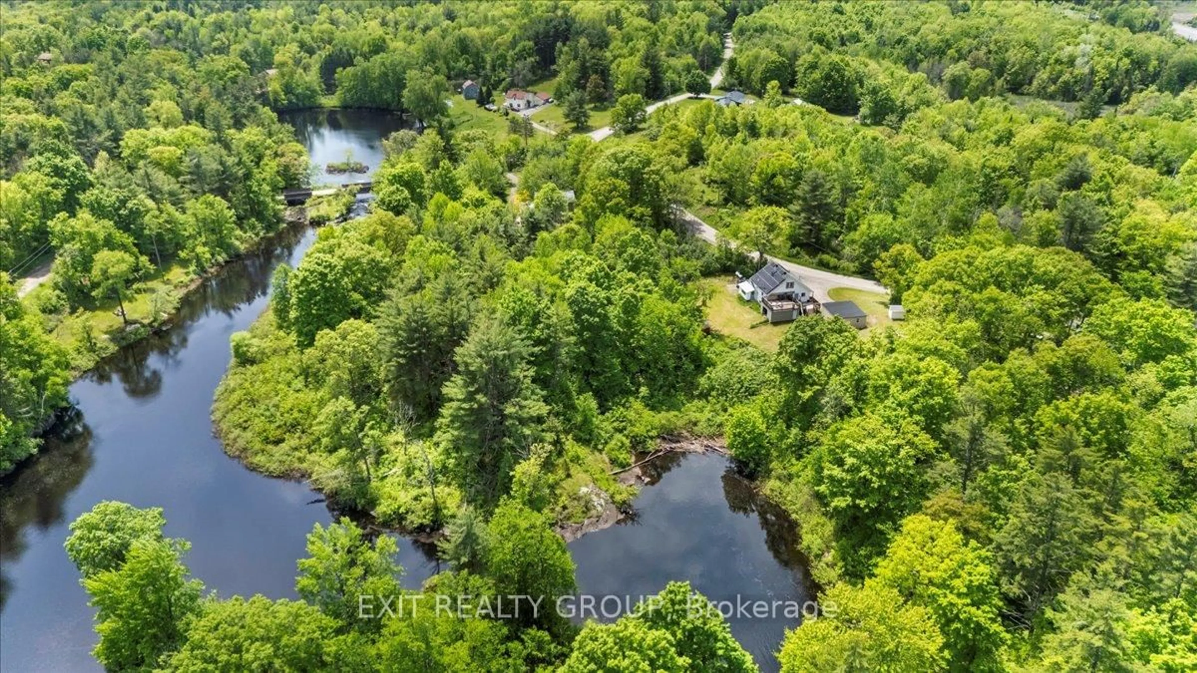A pic from outside/outdoor area/front of a property/back of a property/a pic from drone, water/lake/river/ocean view for 330 Black River Rd, Tweed Ontario K0K 3J0