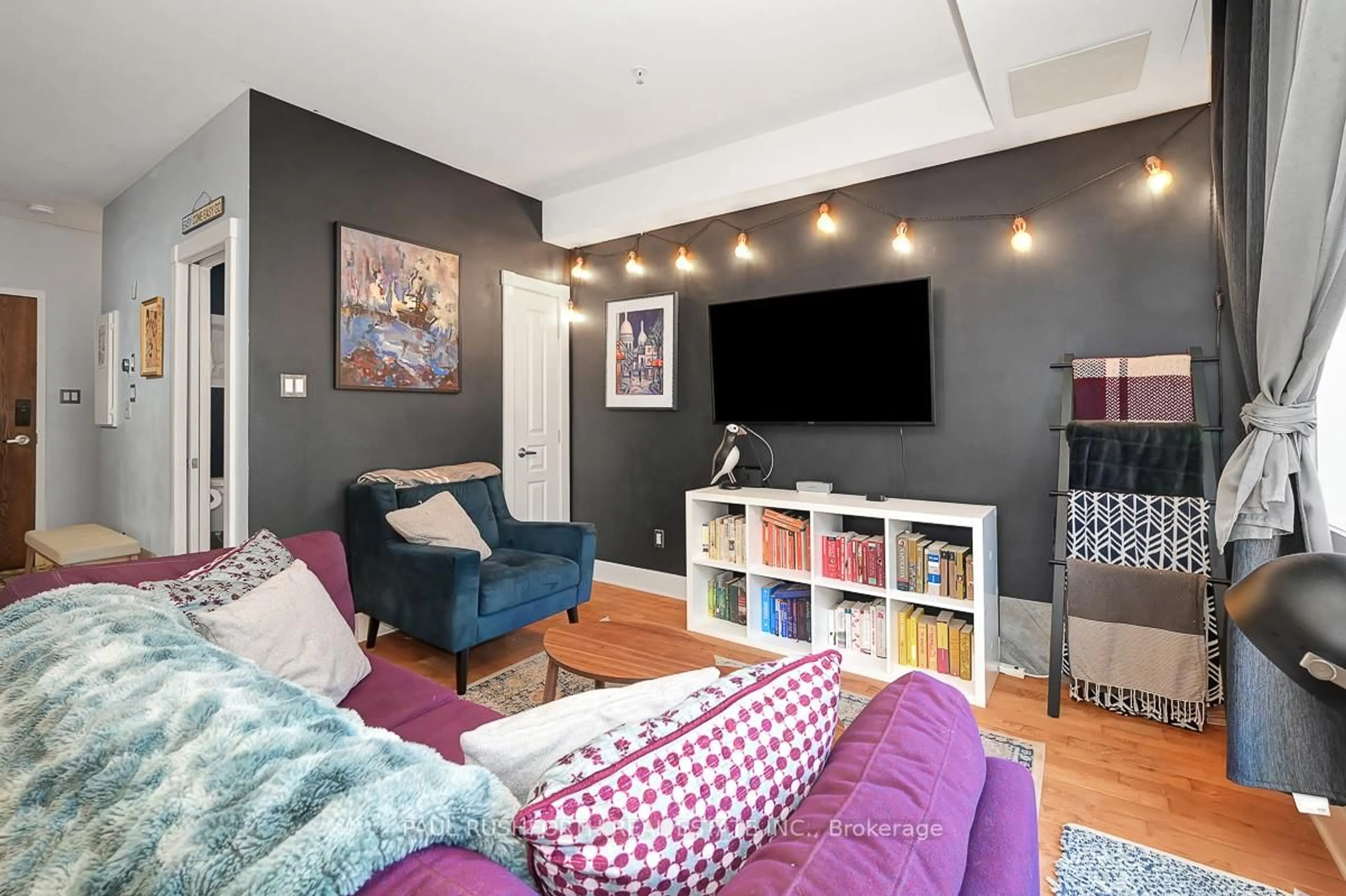 Living room with furniture, unknown for 124 Guigues Ave #B303, Ottawa Ontario K1N 5H7