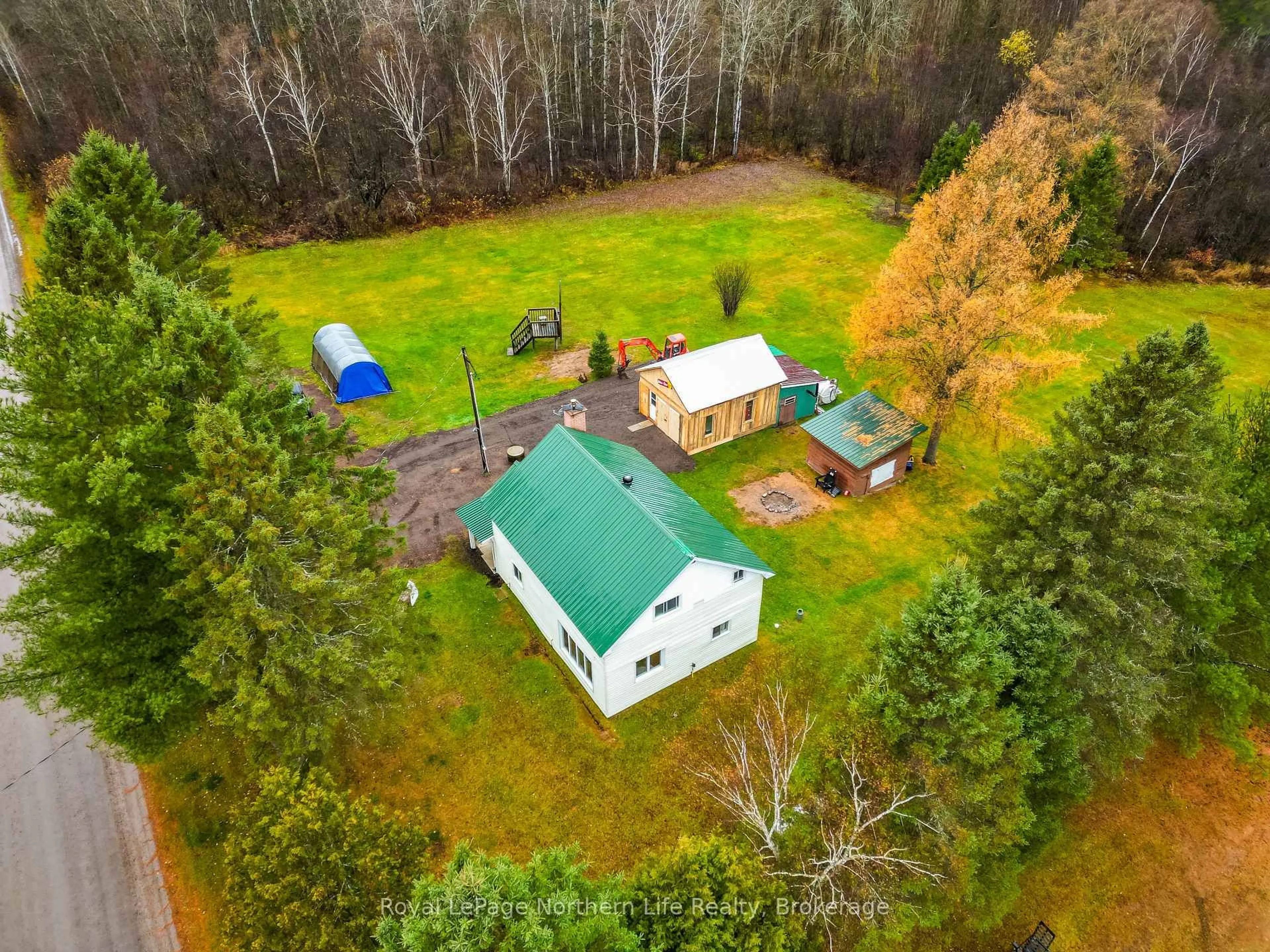 A pic from outside/outdoor area/front of a property/back of a property/a pic from drone, forest/trees view for 264 Moreau Rd, Calvin Ontario P0H 2E0