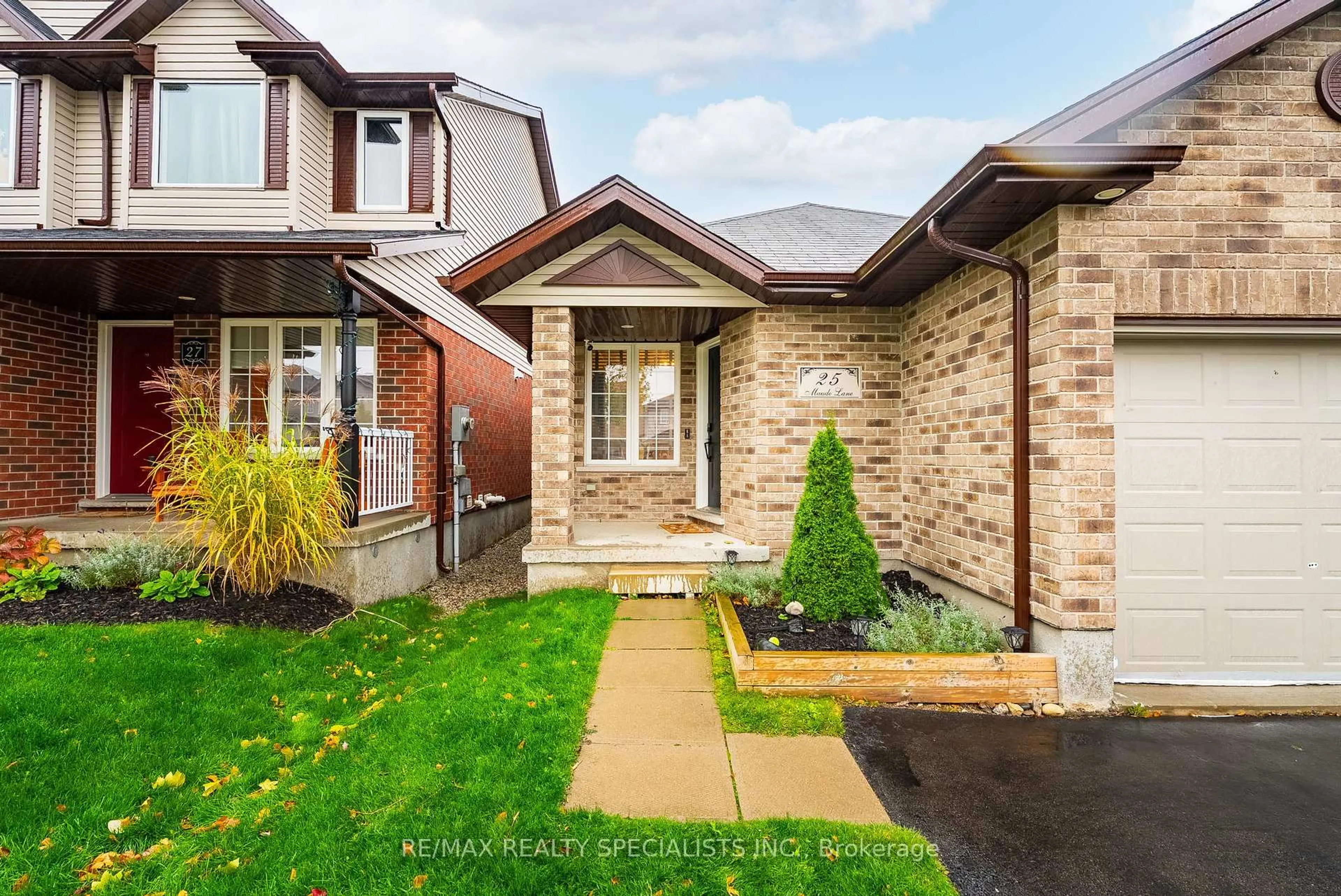 Home with brick exterior material, street for 25 Maude Lane, Guelph Ontario N1E 0G3
