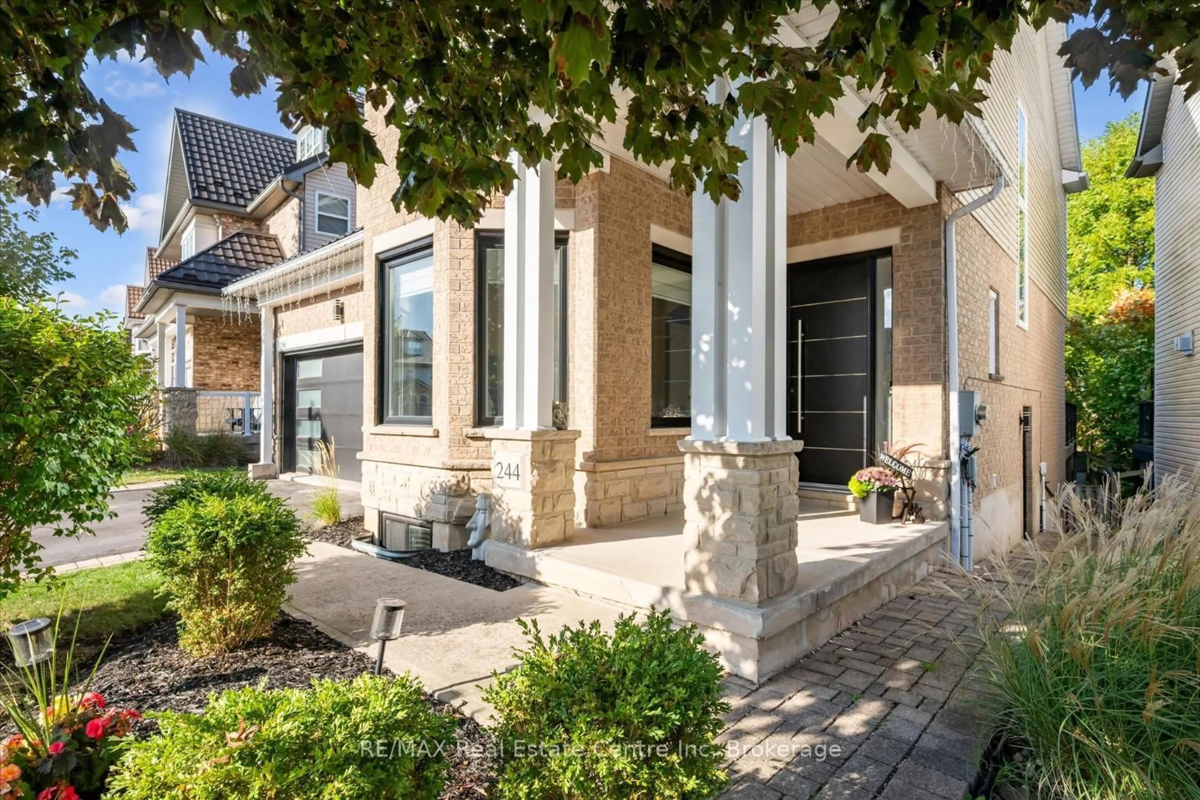 Home with brick exterior material, street for 244 Carrington Dr, Guelph Ontario N1G 5K2