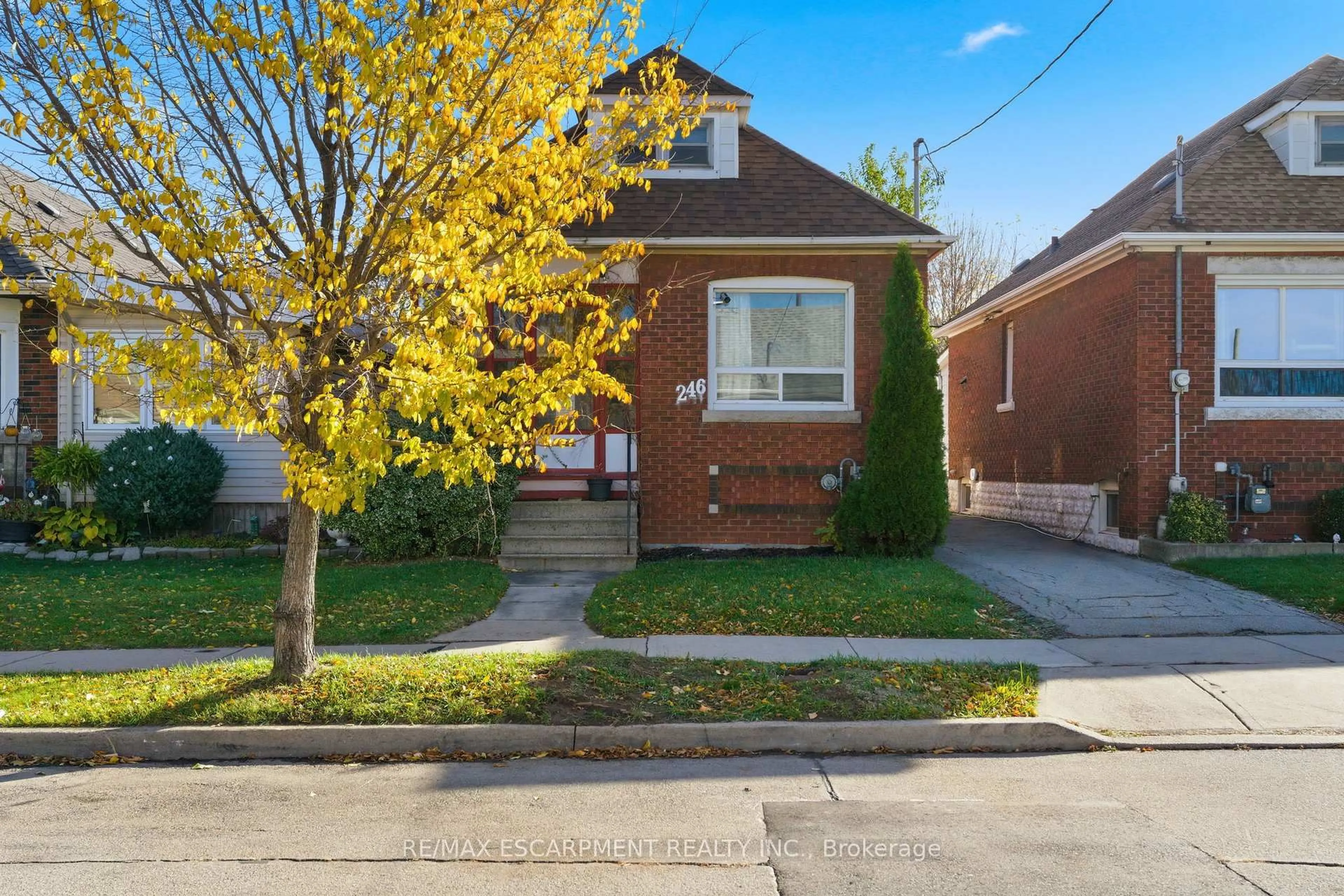 Home with brick exterior material, street for 246 Cope St, Hamilton Ontario L8H 5B5