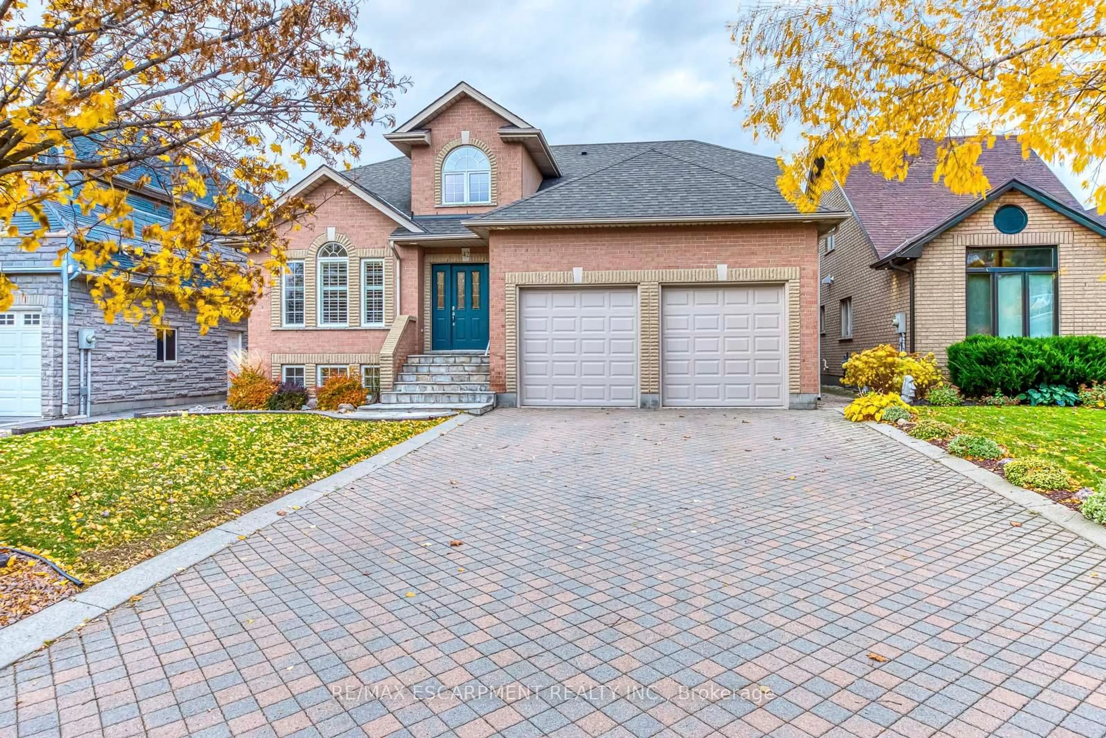 Home with brick exterior material, street for 42 Creanona Blvd, Hamilton Ontario L8E 5T2