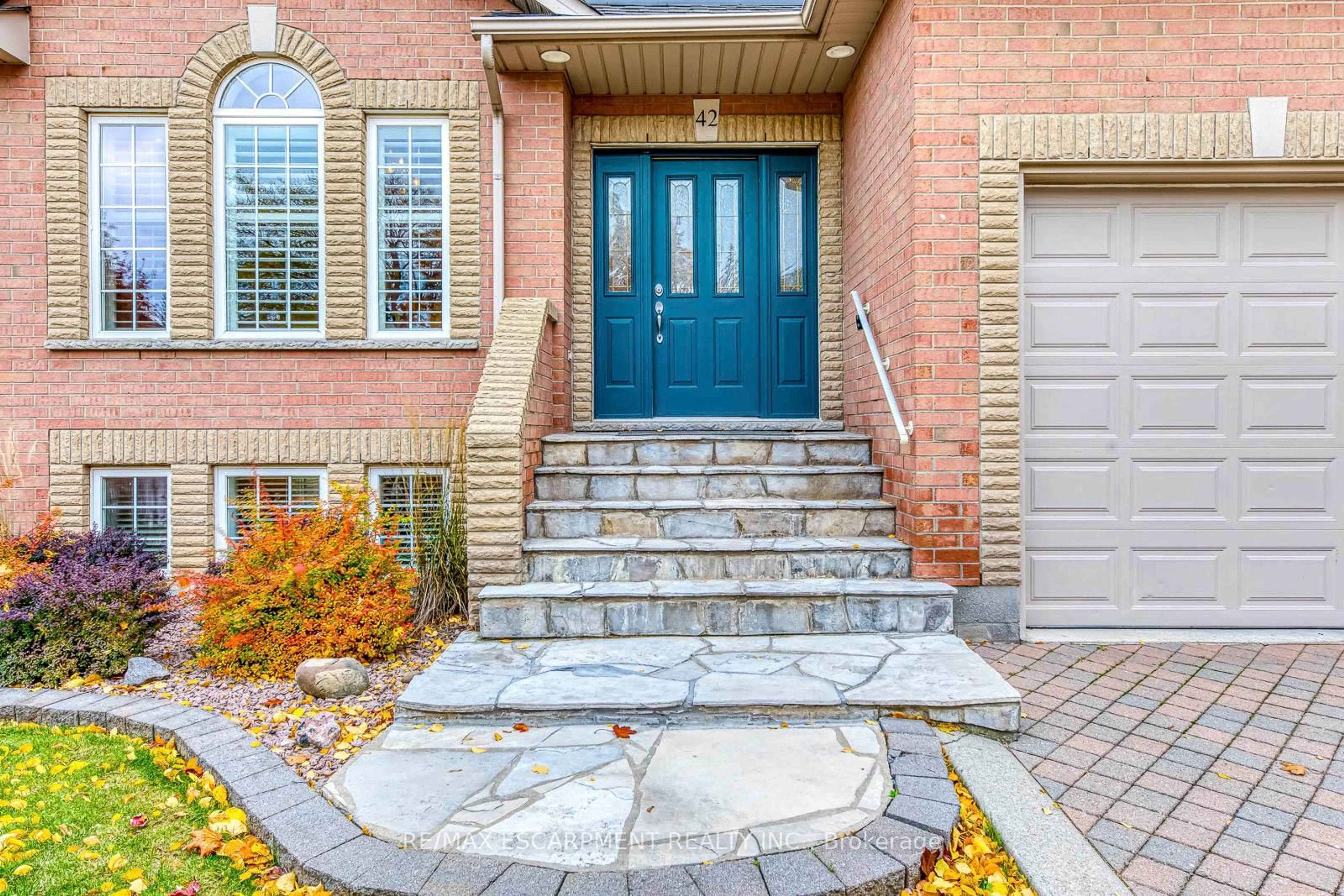 Home with brick exterior material, street for 42 Creanona Blvd, Hamilton Ontario L8E 5T2