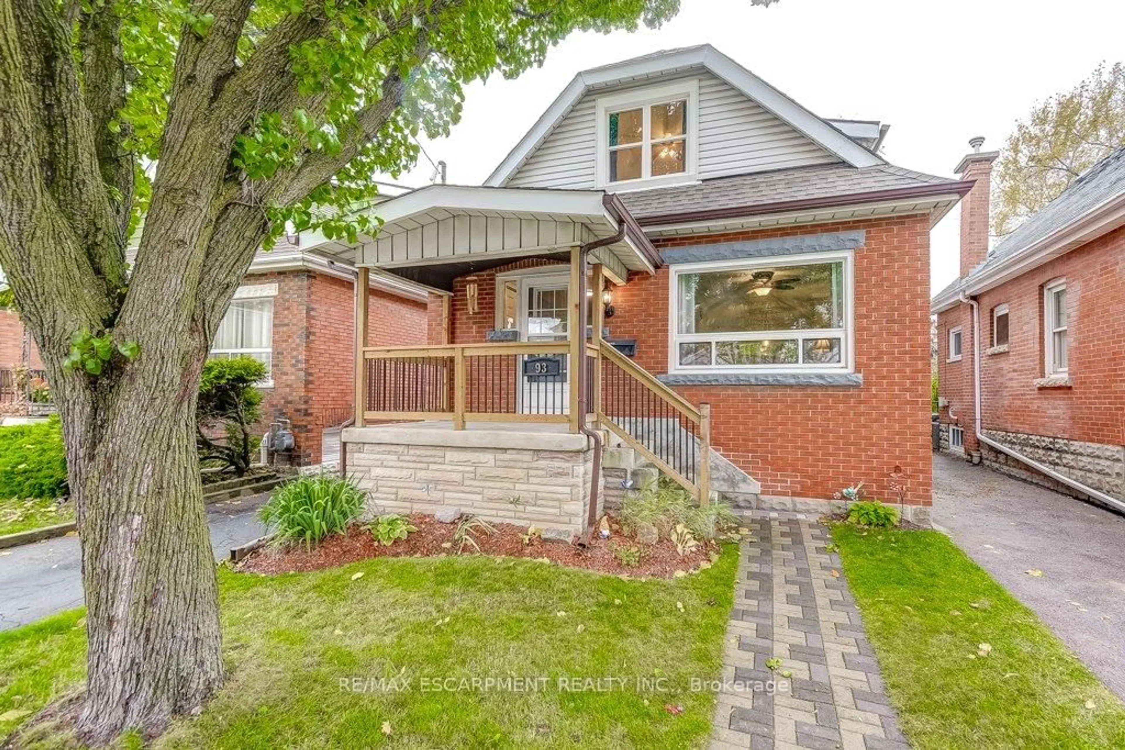 Home with brick exterior material, street for 93 Barons Ave, Hamilton Ontario L8H 5A5