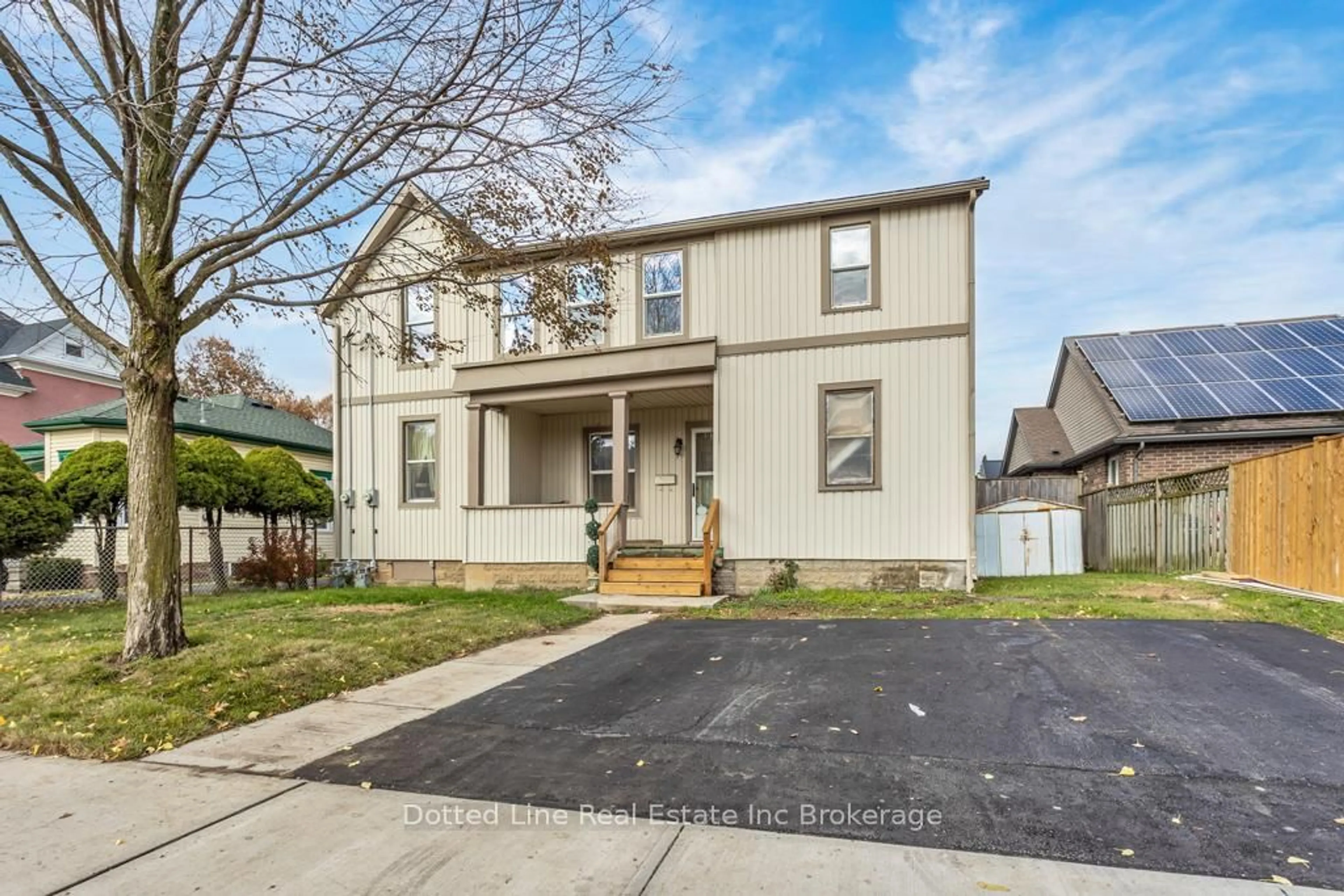 Home with brick exterior material, street for 64 Forest Ave, St. Thomas Ontario N5R 2J3