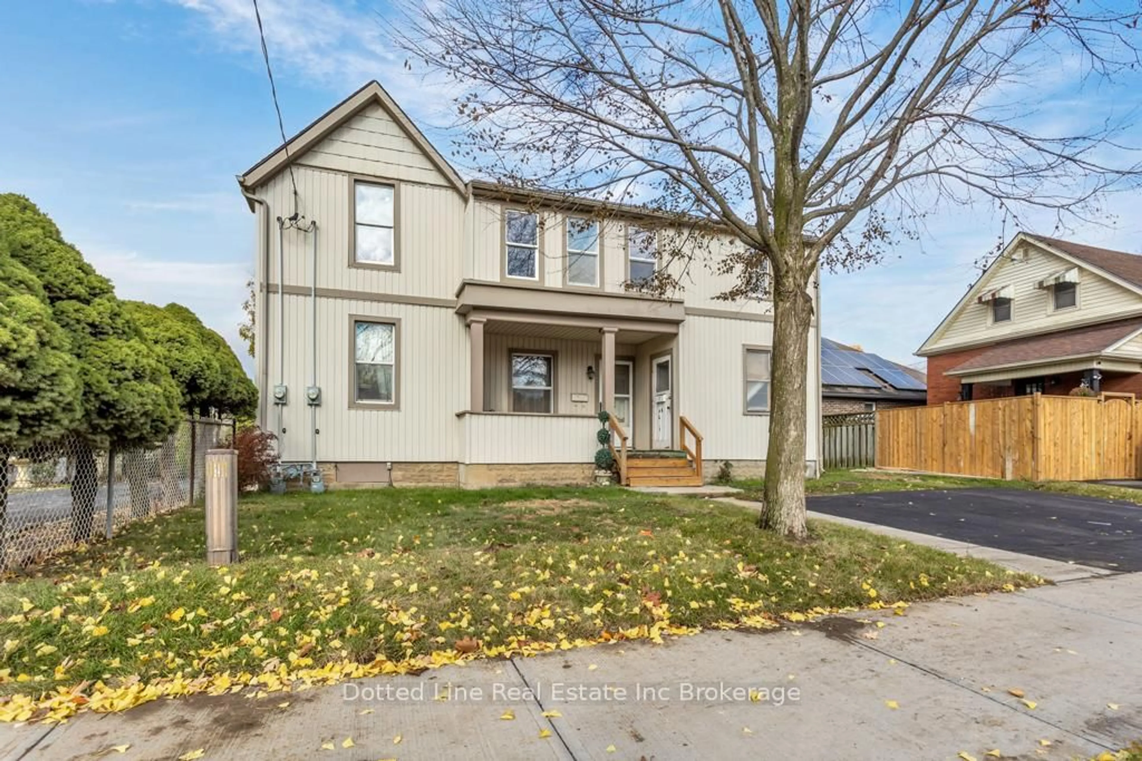 Home with brick exterior material, street for 64 Forest Ave, St. Thomas Ontario N5R 2J3