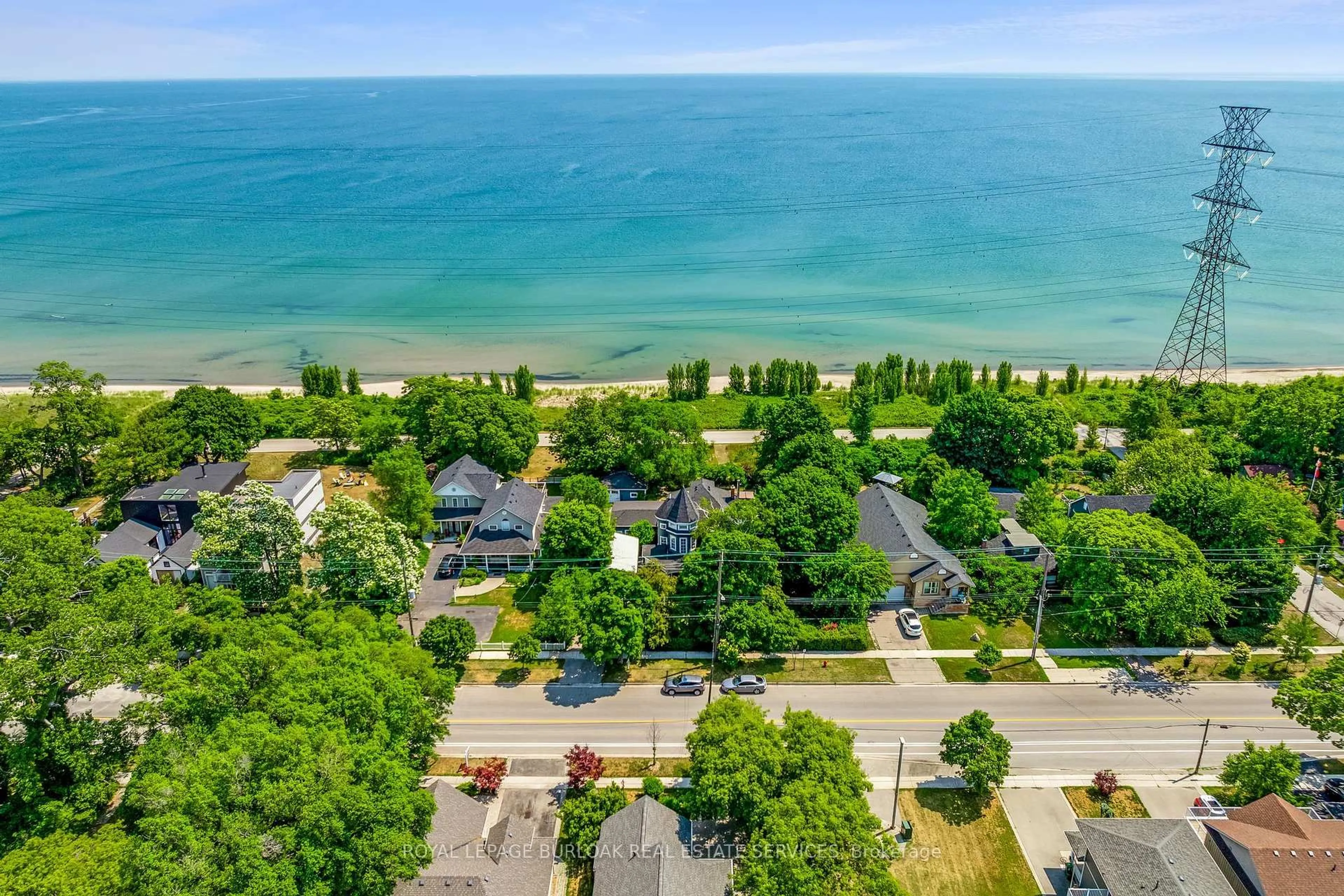 A pic from outside/outdoor area/front of a property/back of a property/a pic from drone, water/lake/river/ocean view for 957 Beach Blvd, Hamilton Ontario L8H 6Z7