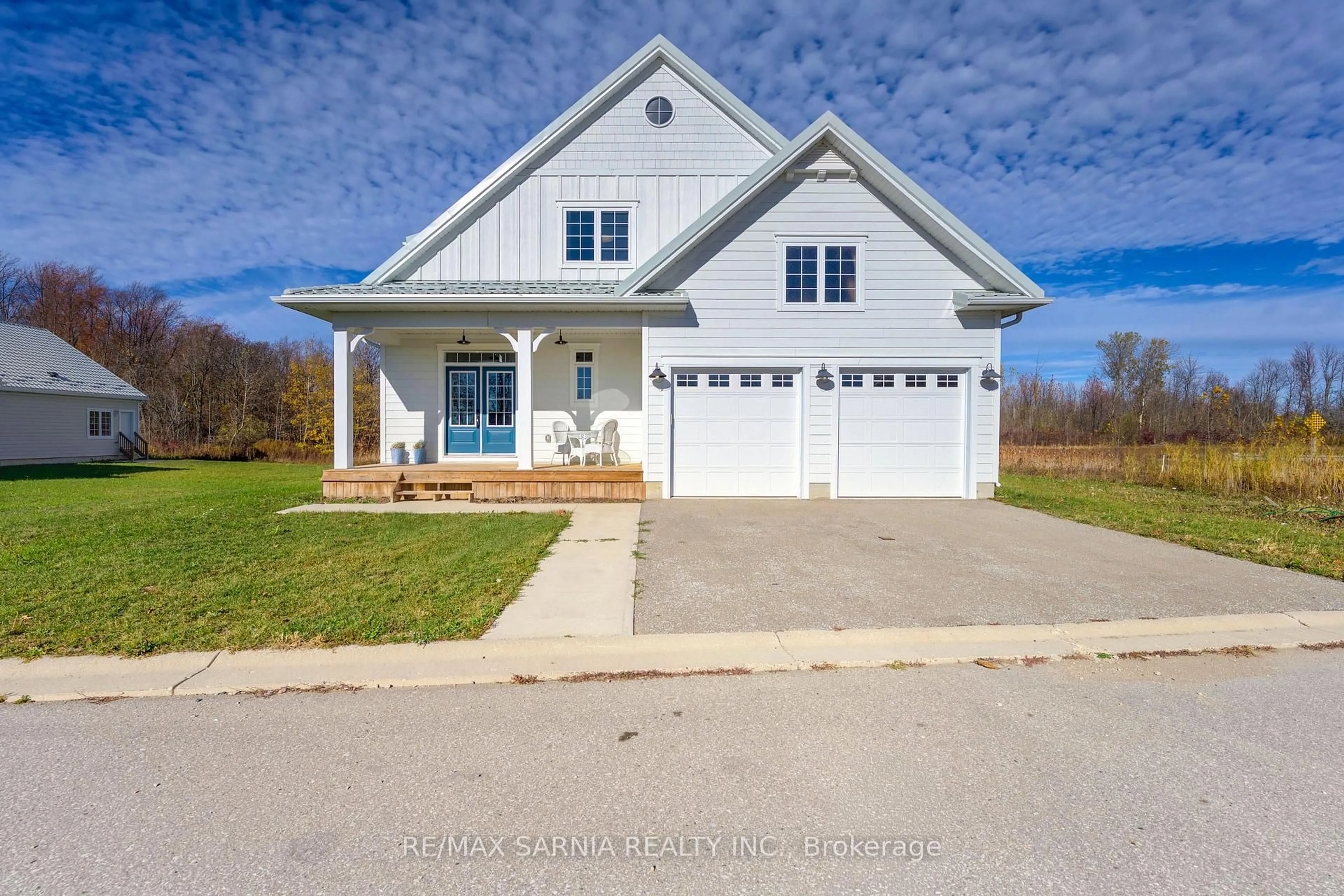 Home with vinyl exterior material, street for 4140 Boardwalk Ave, Plympton-Wyoming Ontario N0N 1J0