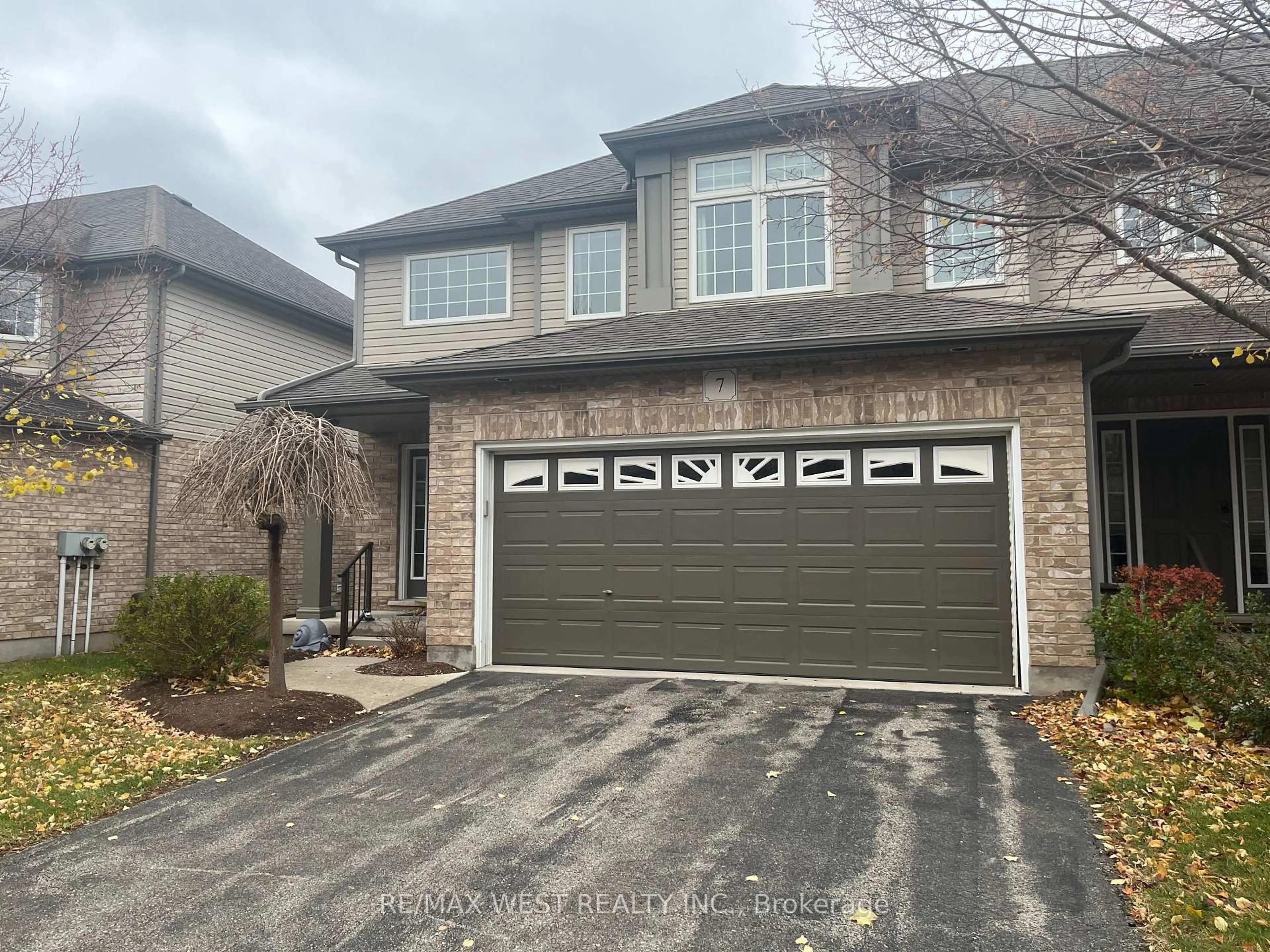 Home with brick exterior material, street for 255 Summerfield Dr #7, Guelph Ontario N1L 0E1