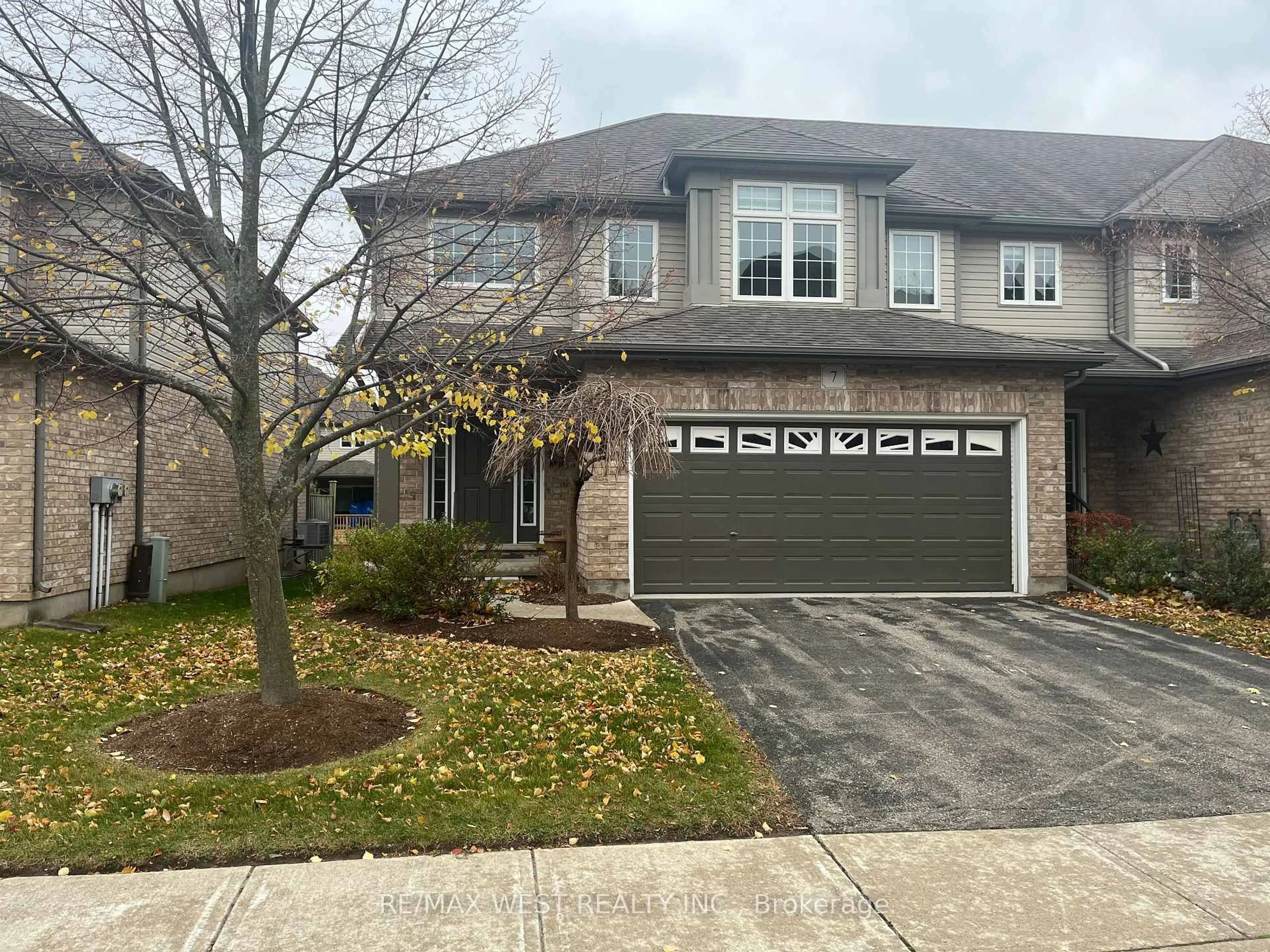 Home with brick exterior material, street for 255 Summerfield Dr #7, Guelph Ontario N1L 0E1