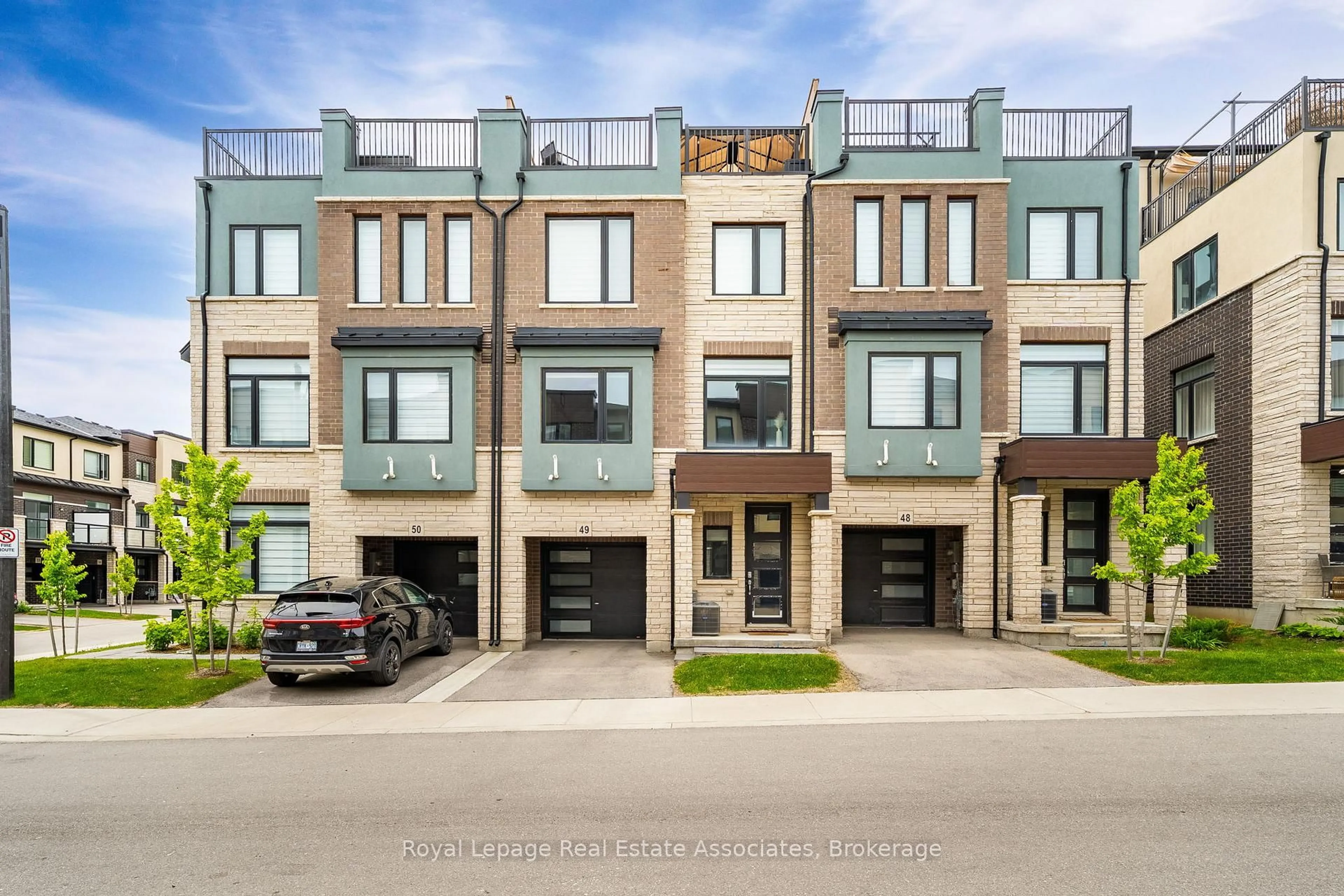 Home with brick exterior material, street for 314 Equestrian Way #49, Cambridge Ontario N3E 0E4