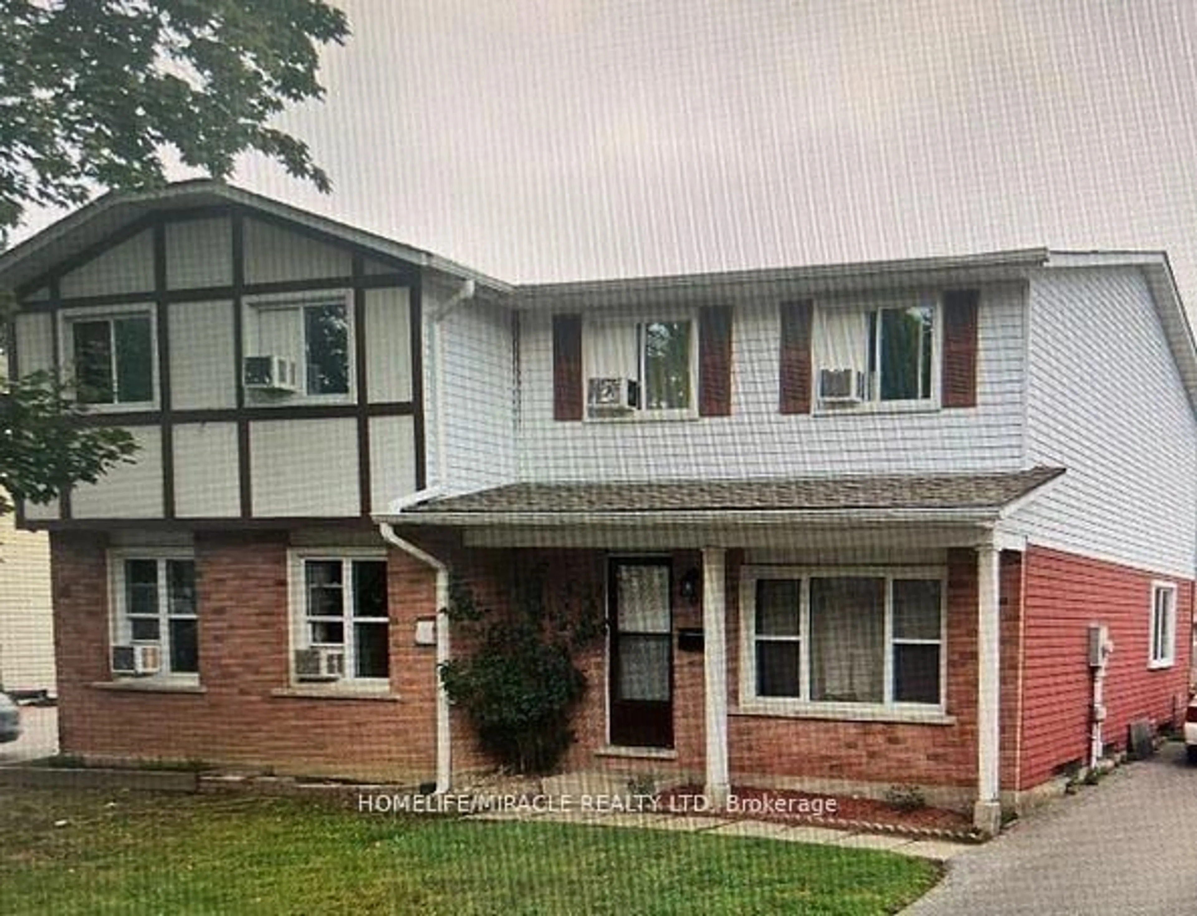 Home with vinyl exterior material, street for 20 Mayfield Ave #1, Waterloo Ontario N2J 4M5