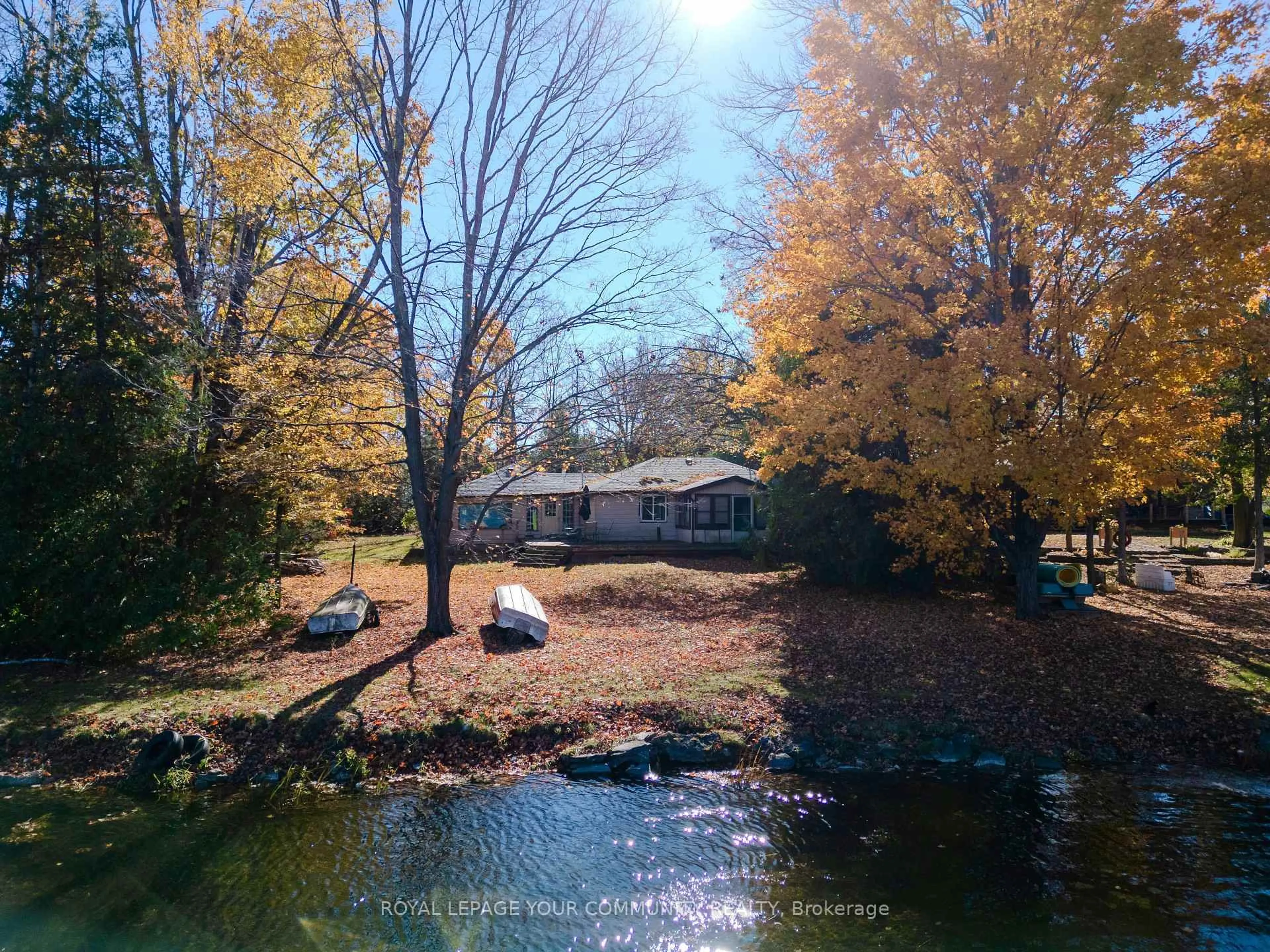 A pic from outside/outdoor area/front of a property/back of a property/a pic from drone, water/lake/river/ocean view for 69 Fall's Bay Rd, Kawartha Lakes Ontario K0M 1A0