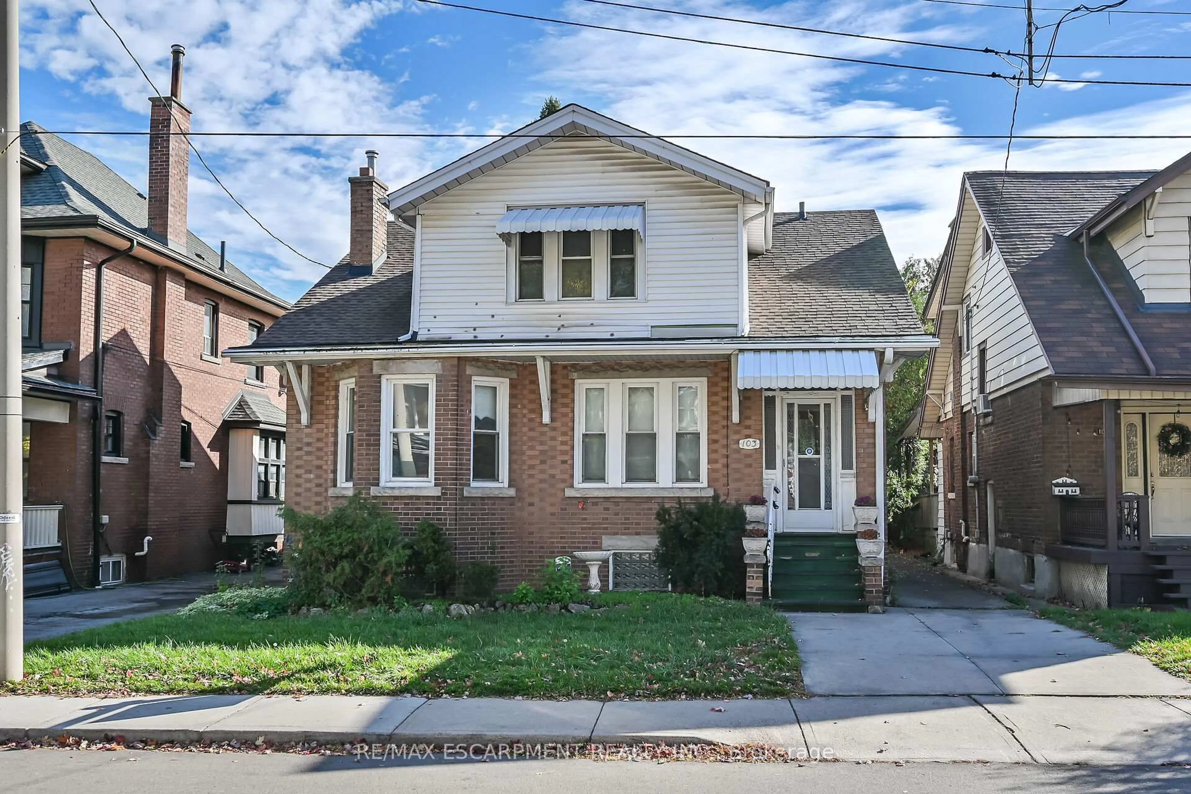 Home with brick exterior material, street for 103 Leinster Ave, Hamilton Ontario L8M 3A4