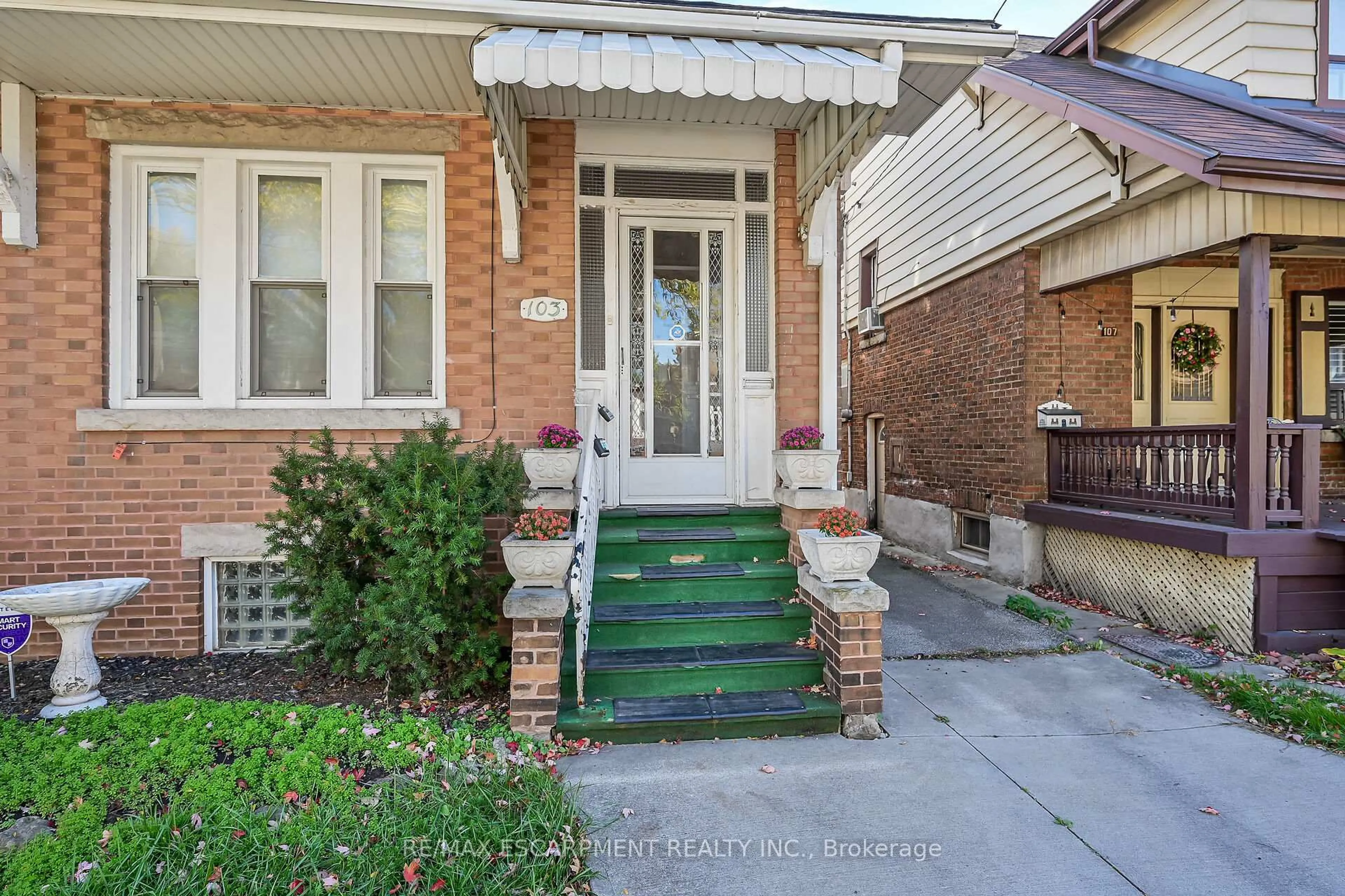 Home with brick exterior material, street for 103 Leinster Ave, Hamilton Ontario L8M 3A4