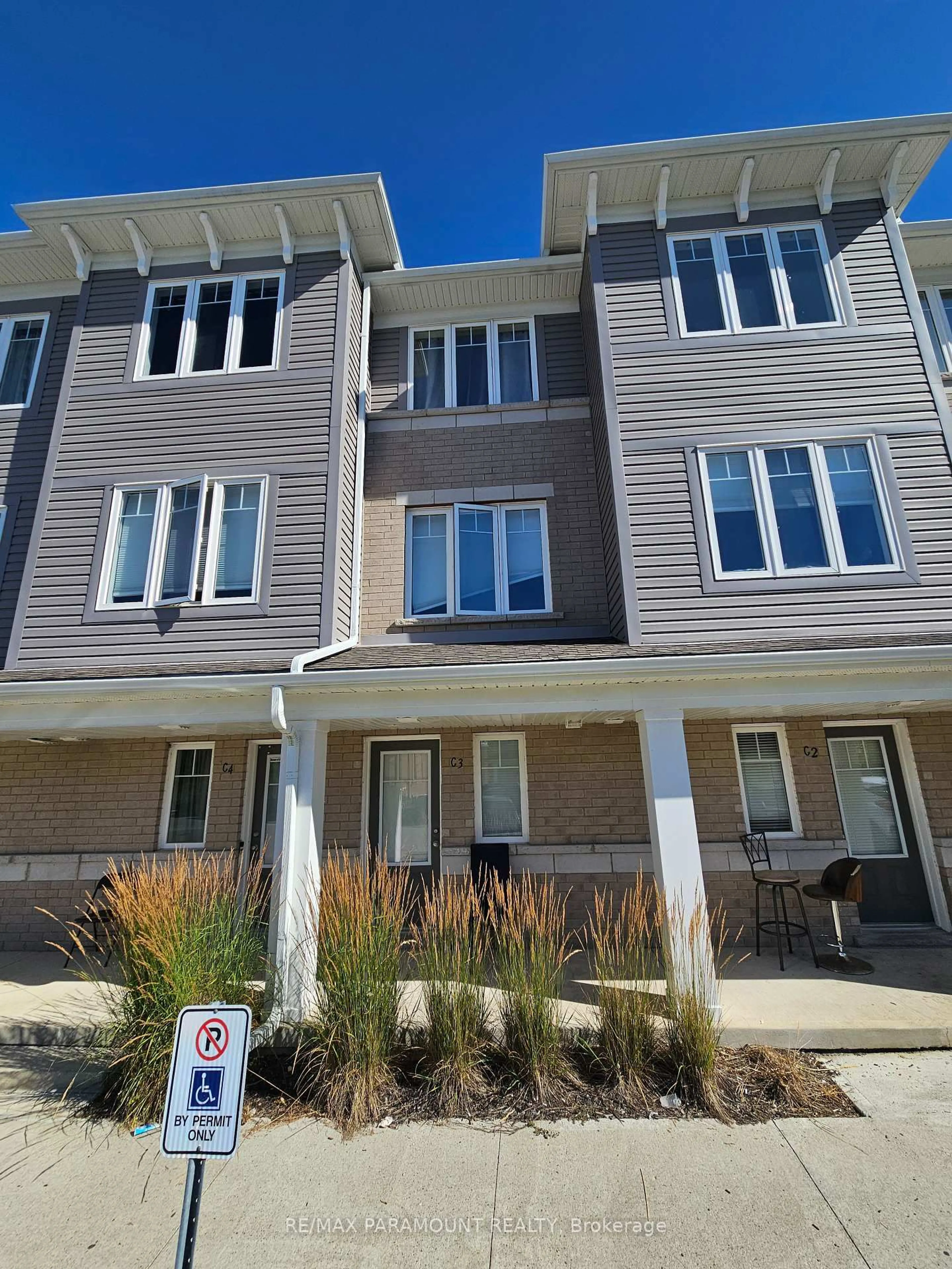 Home with vinyl exterior material, street for 24 Morrison Rd #C3, Kitchener Ontario N2A 0L1