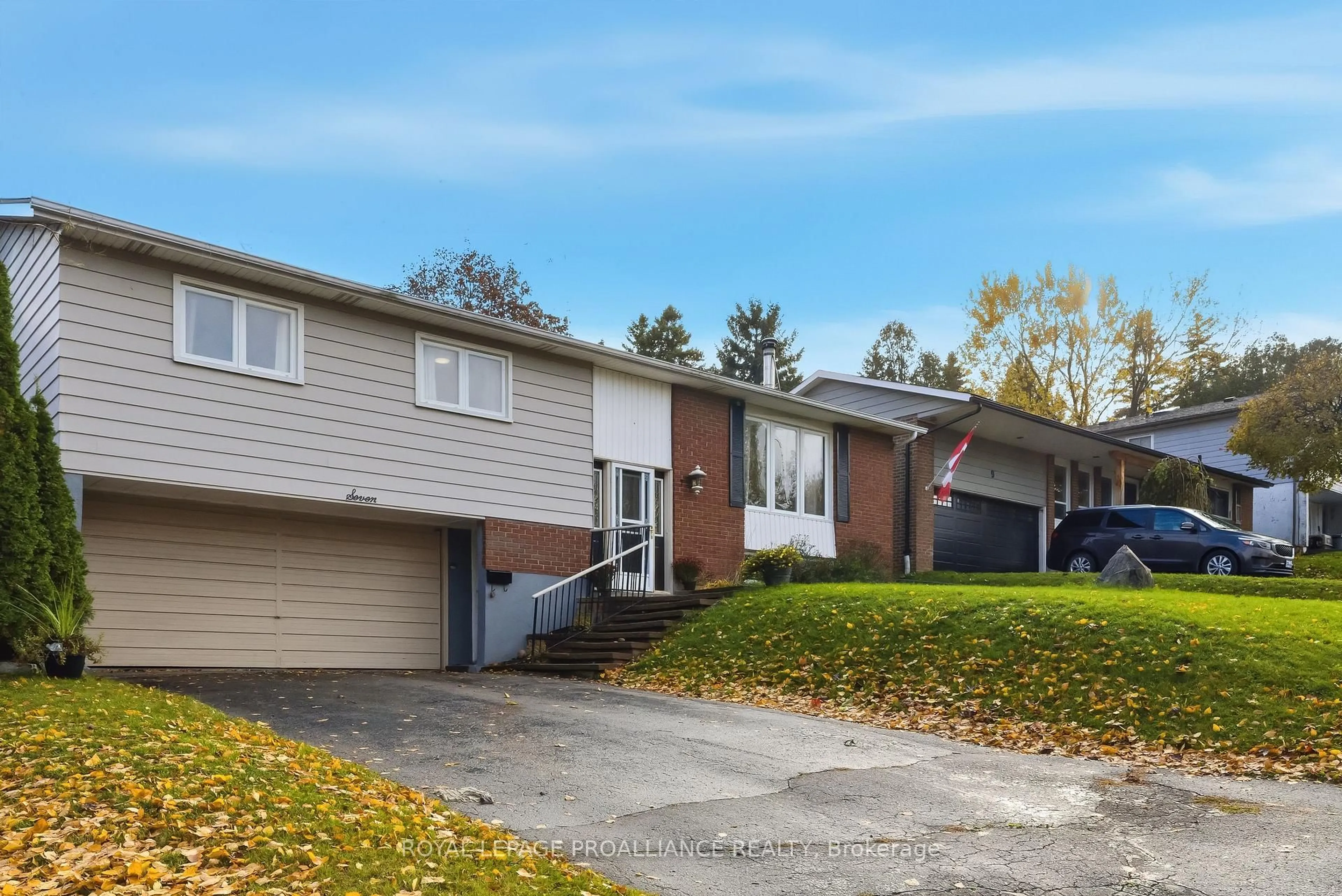 Home with vinyl exterior material, street for 7 Centennial Dr, Port Hope Ontario L1A 3S9