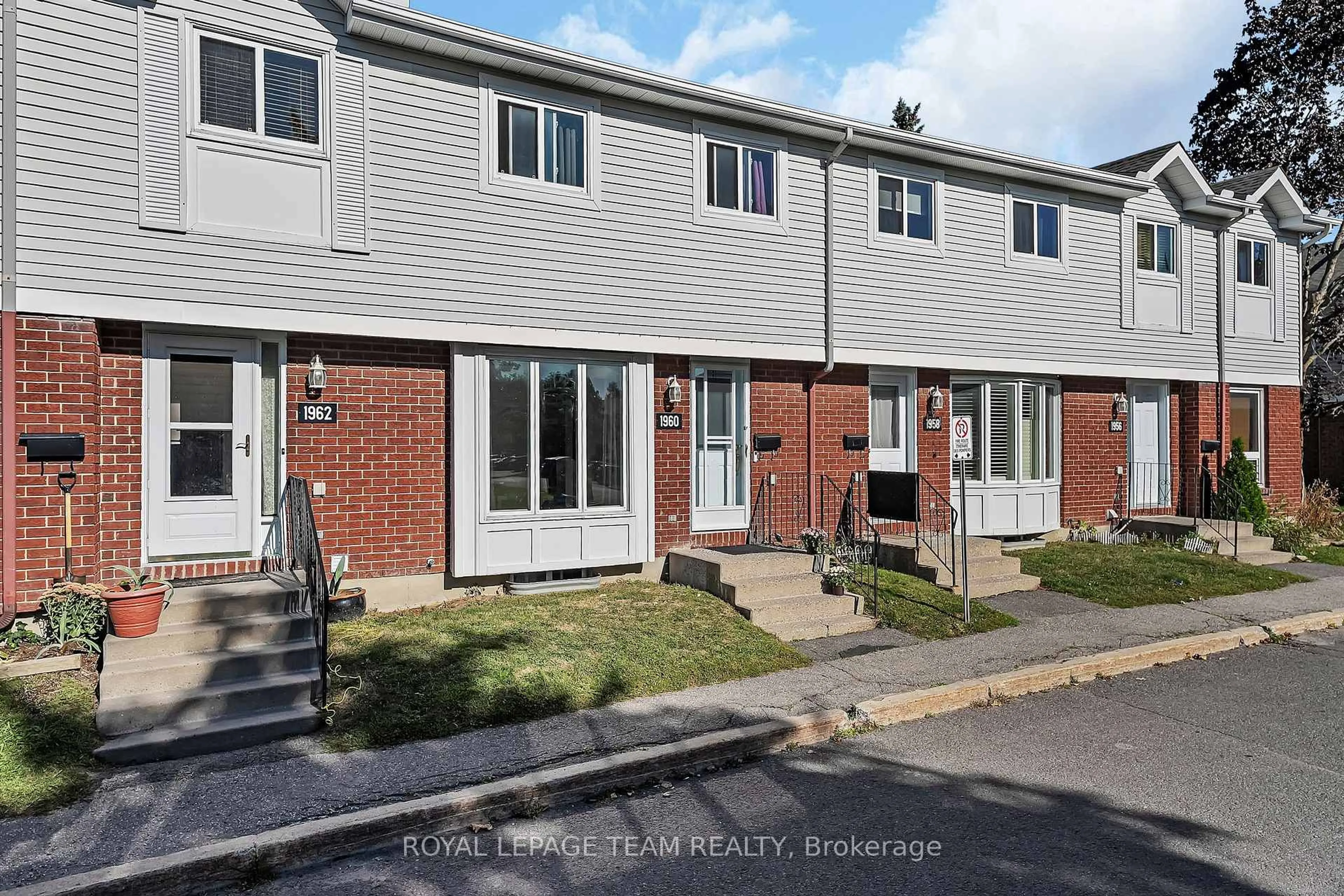 A pic from outside/outdoor area/front of a property/back of a property/a pic from drone, street for 1960 Colorado Lane #21, Orleans Ontario K1C 6T9