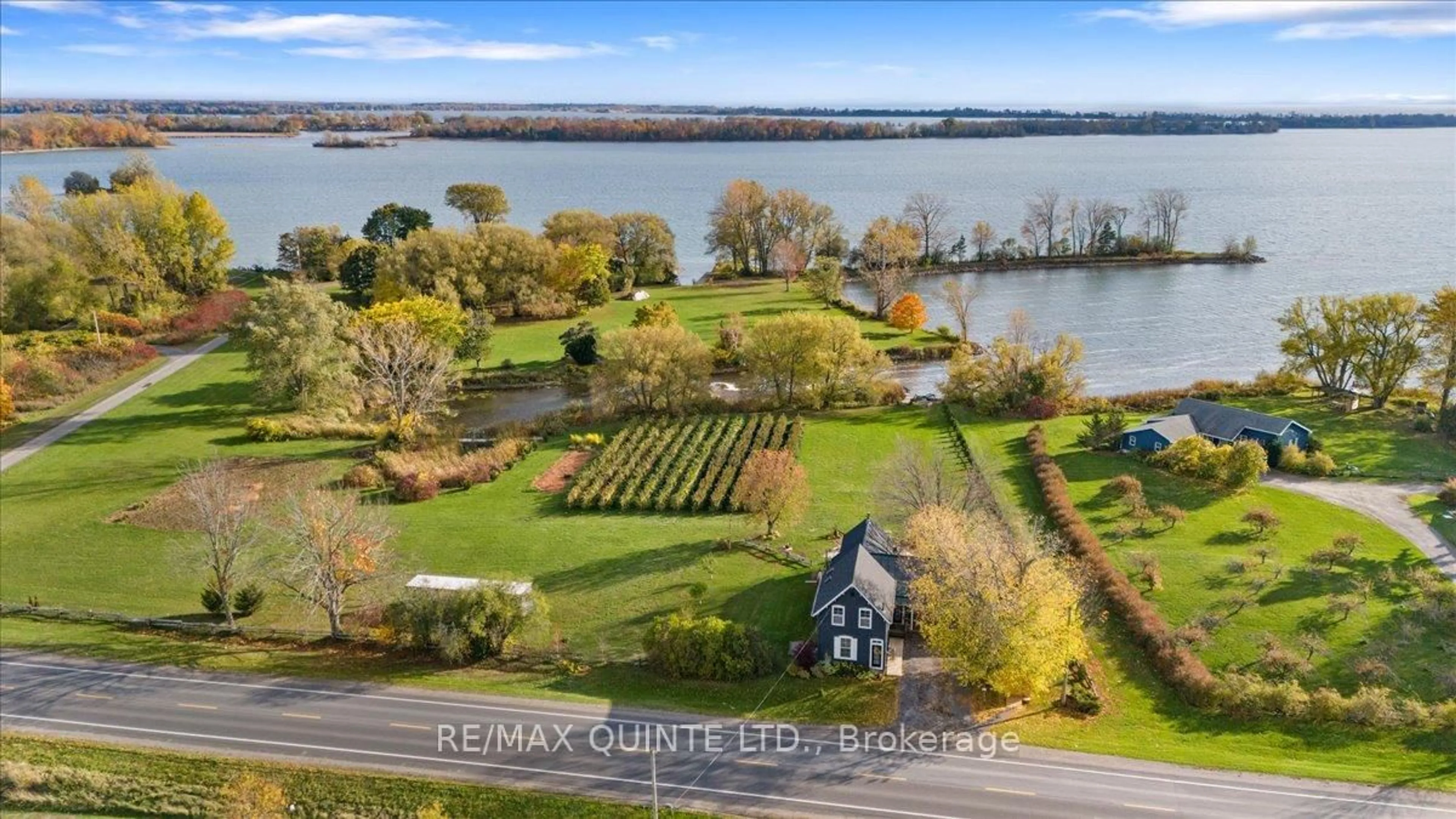 A pic from outside/outdoor area/front of a property/back of a property/a pic from drone, water/lake/river/ocean view for 15775 Loyalist Pkwy, Prince Edward County Ontario K0K 1G0