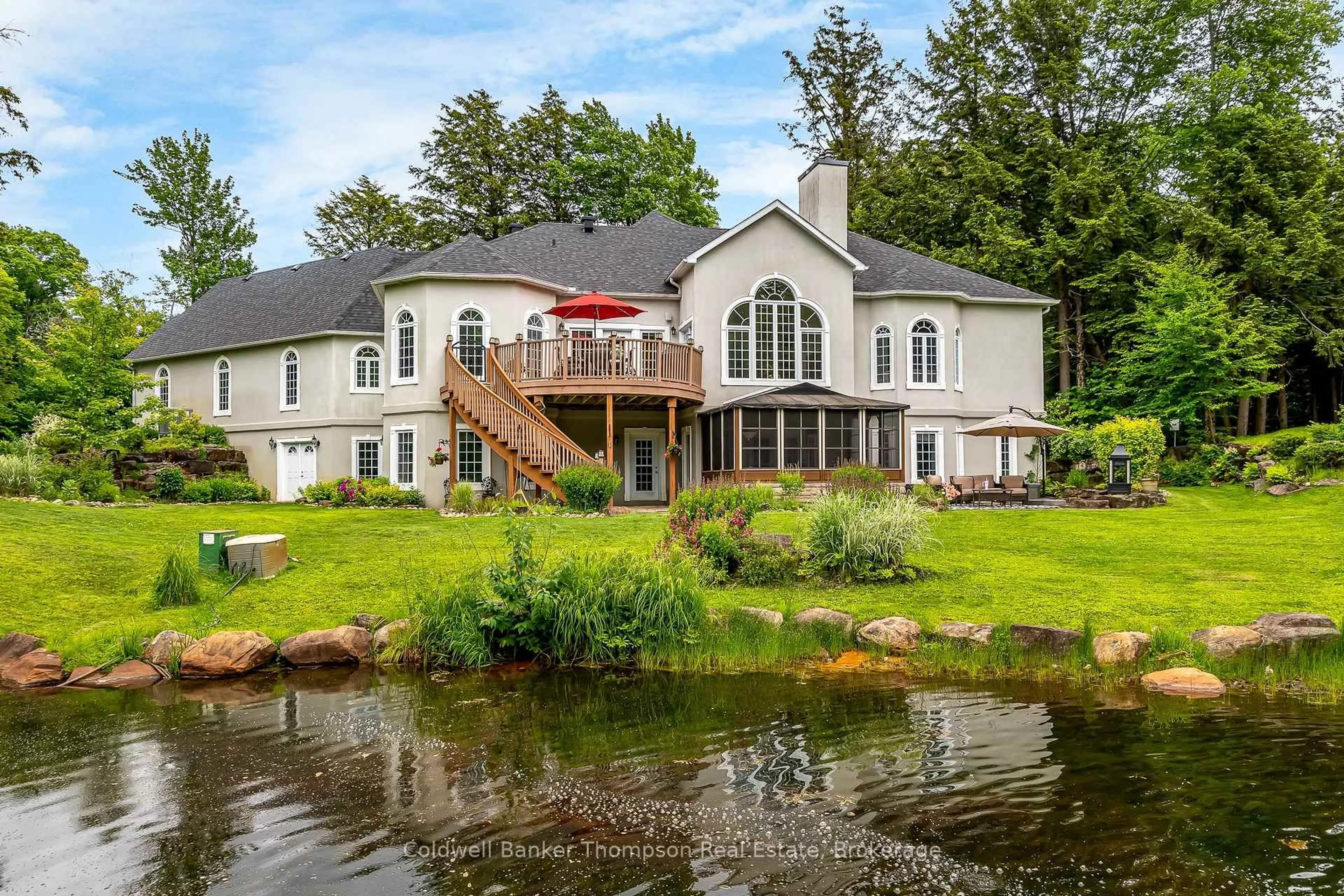 A pic from outside/outdoor area/front of a property/back of a property/a pic from drone, water/lake/river/ocean view for 87 Deerfoot Tr, Huntsville Ontario P1H 0A7