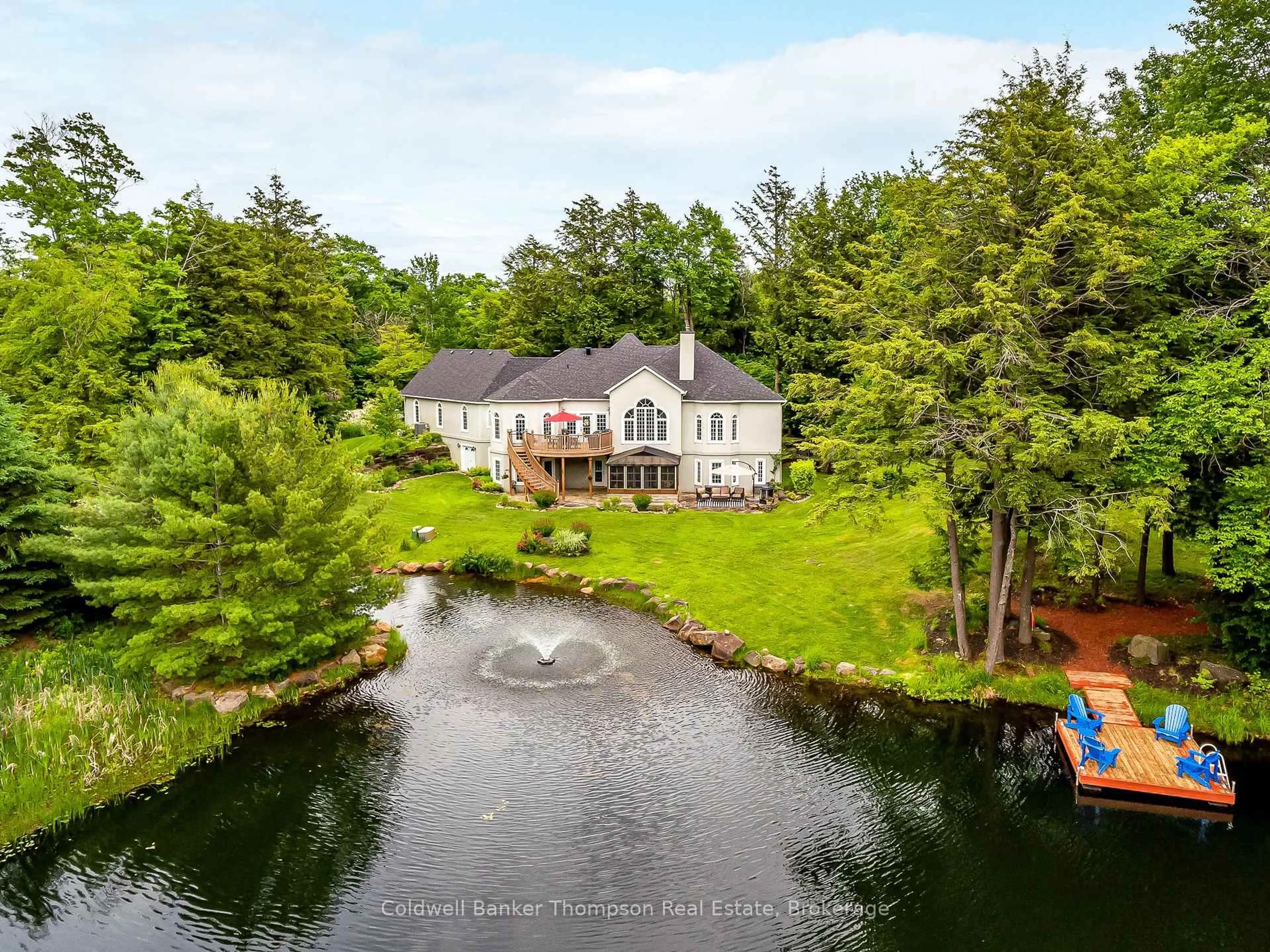 A pic from outside/outdoor area/front of a property/back of a property/a pic from drone, water/lake/river/ocean view for 87 Deerfoot Tr, Huntsville Ontario P1H 0A7