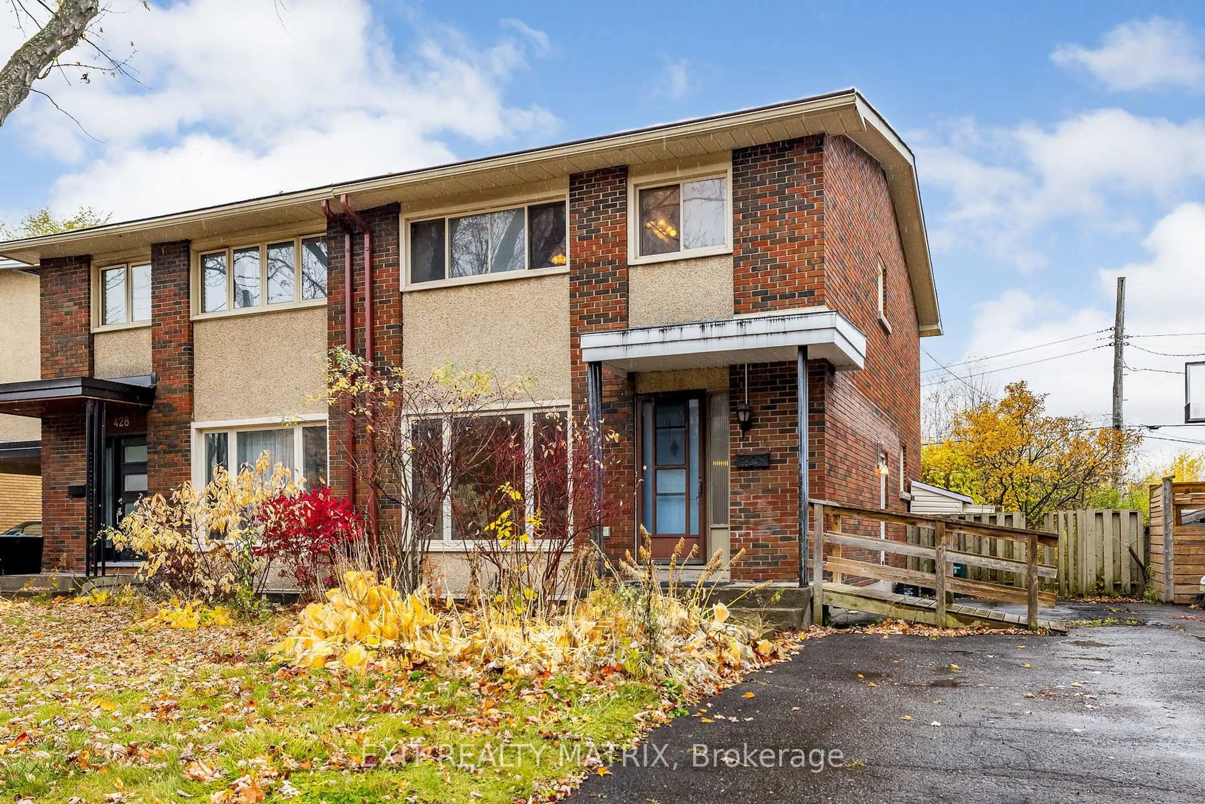 Home with brick exterior material, street for 426 Apple Tree Lane, Ottawa Ontario K1K 2R6