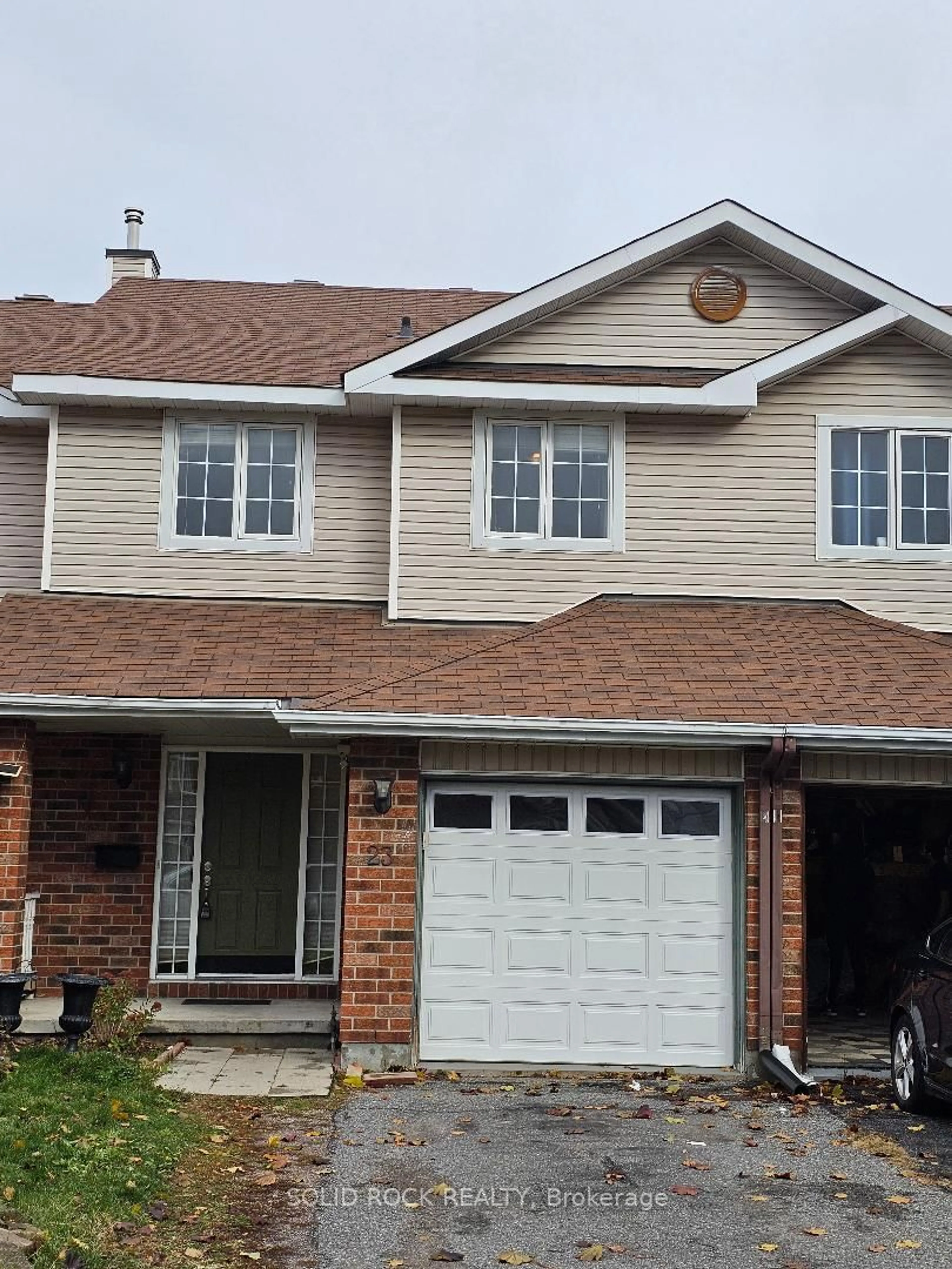 Home with vinyl exterior material, street for 23 ORISKA Way, Nepean Ontario K2J 4N7