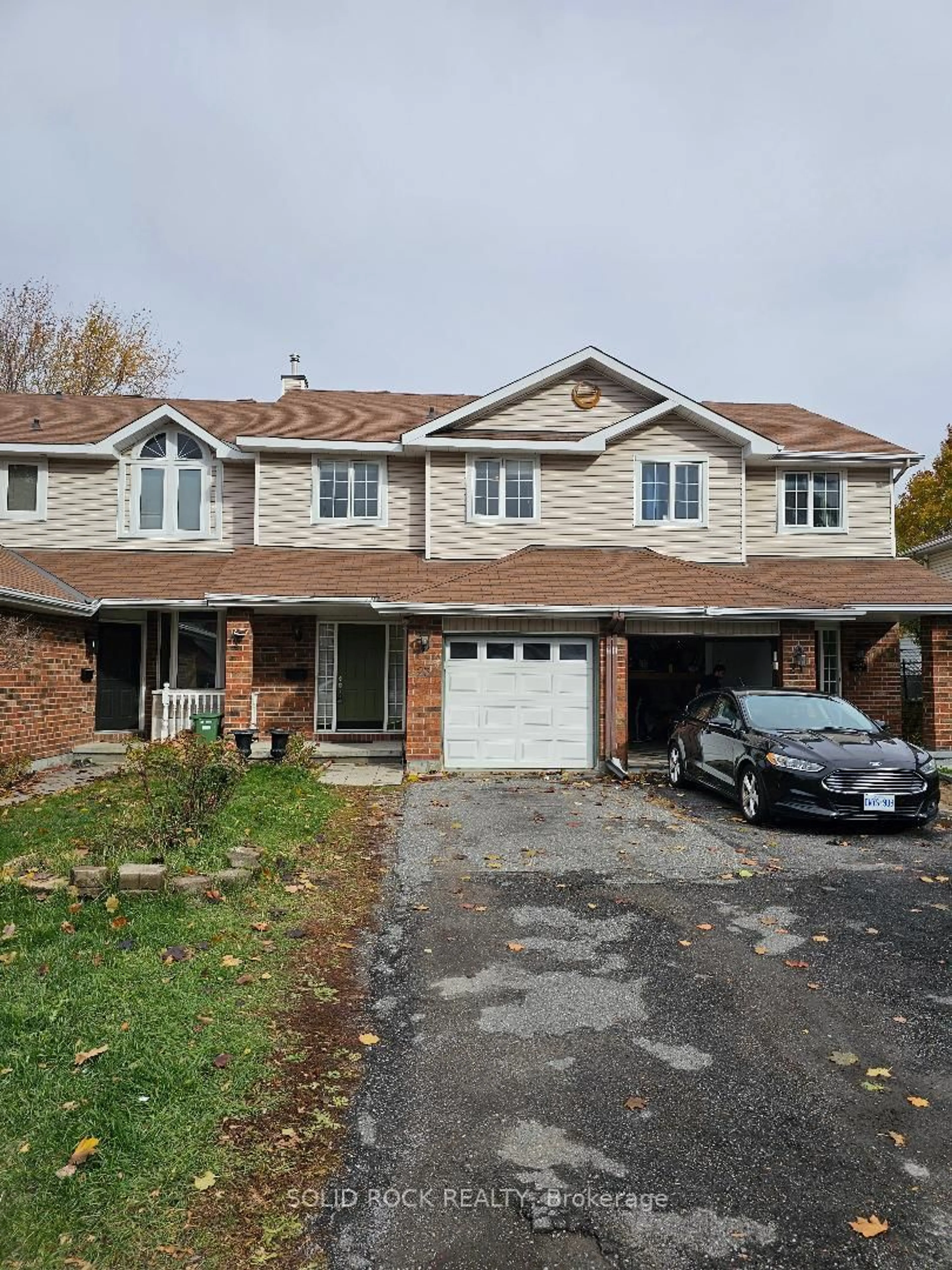 Home with brick exterior material, street for 23 ORISKA Way, Nepean Ontario K2J 4N7
