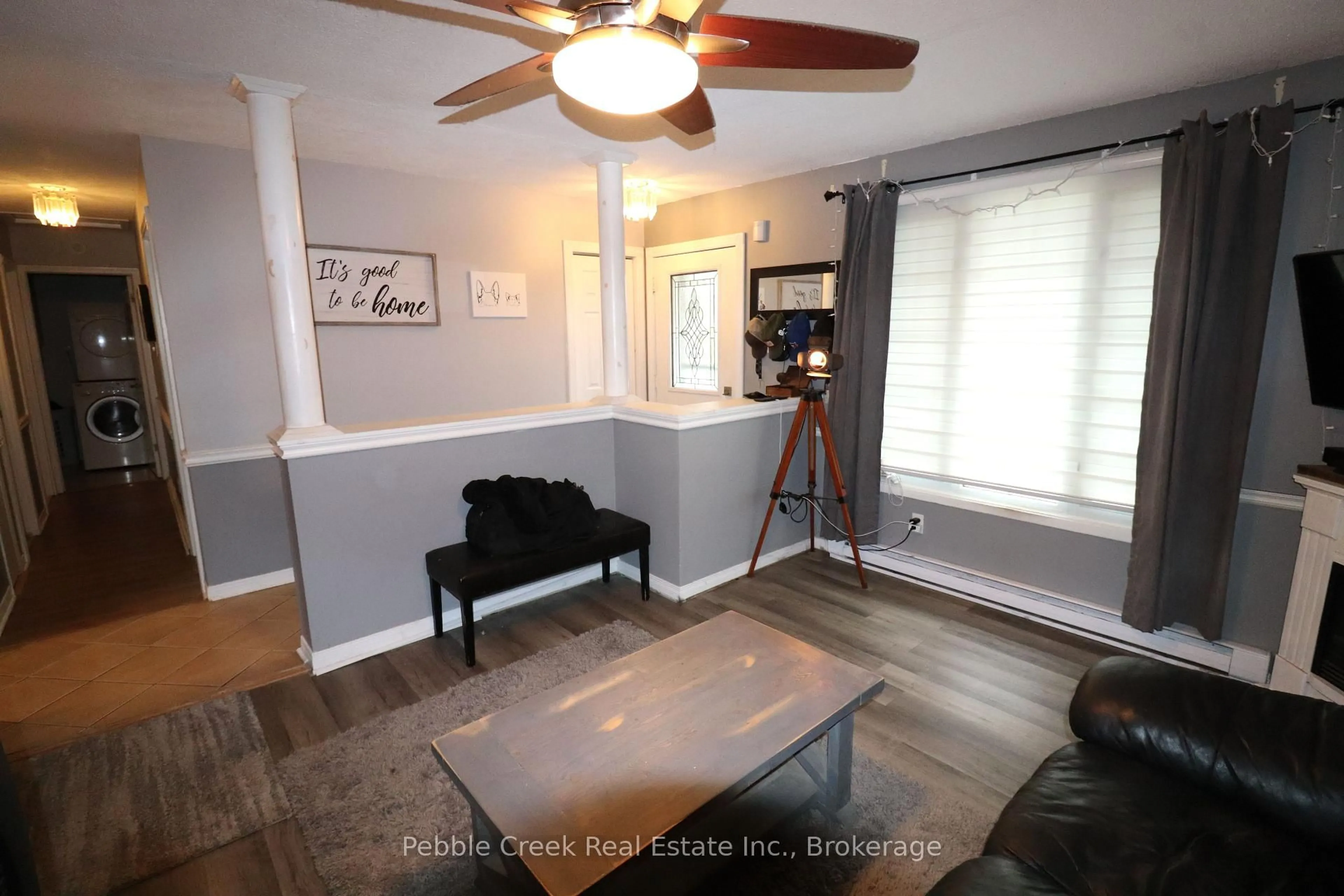 Living room with furniture, wood/laminate floor for 790 Andrew Malcolm Dr, Kincardine Ontario N2Z 1M7