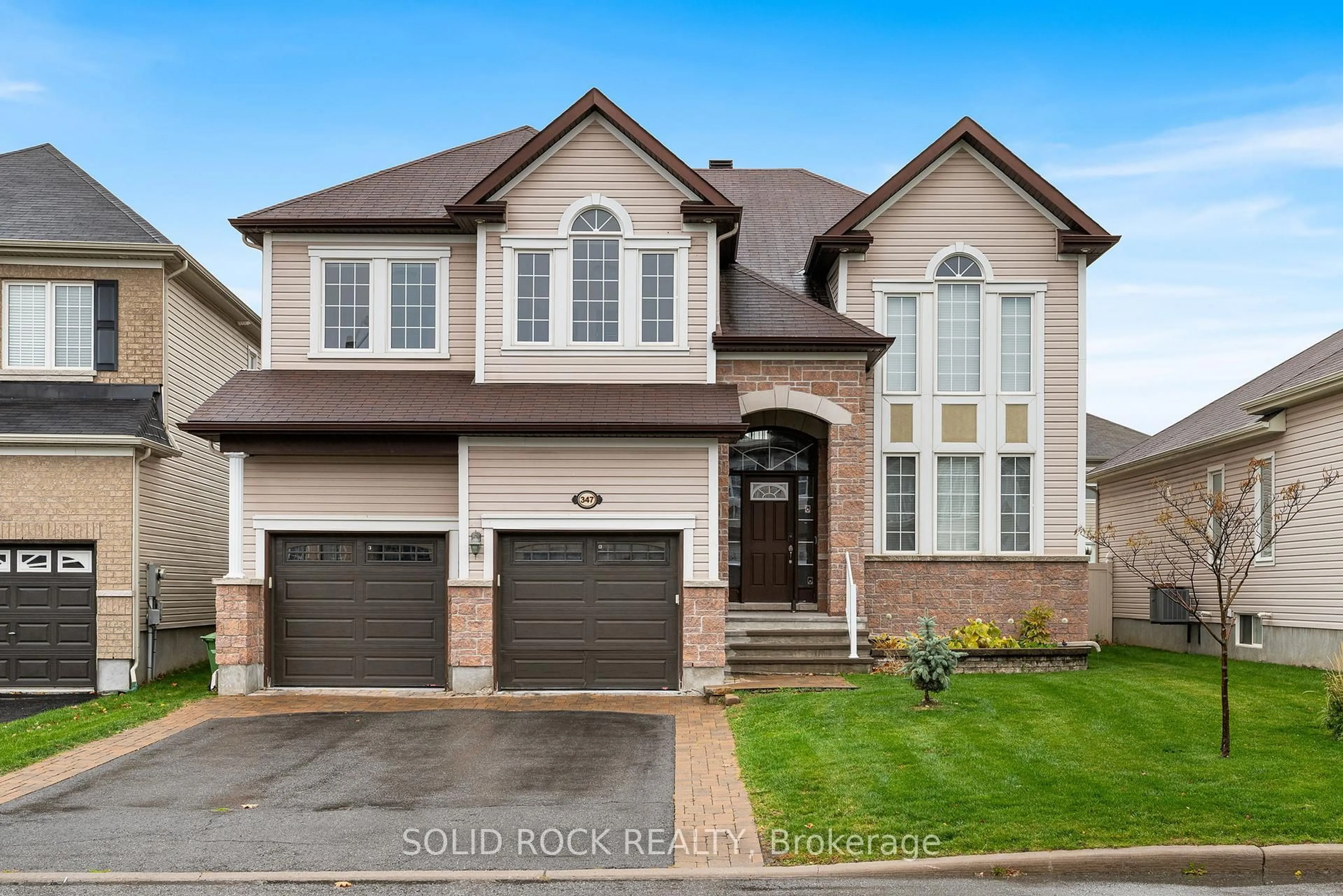 Home with brick exterior material, street for 347 Bamburgh Way, Ottawa Ontario K2J 5R1