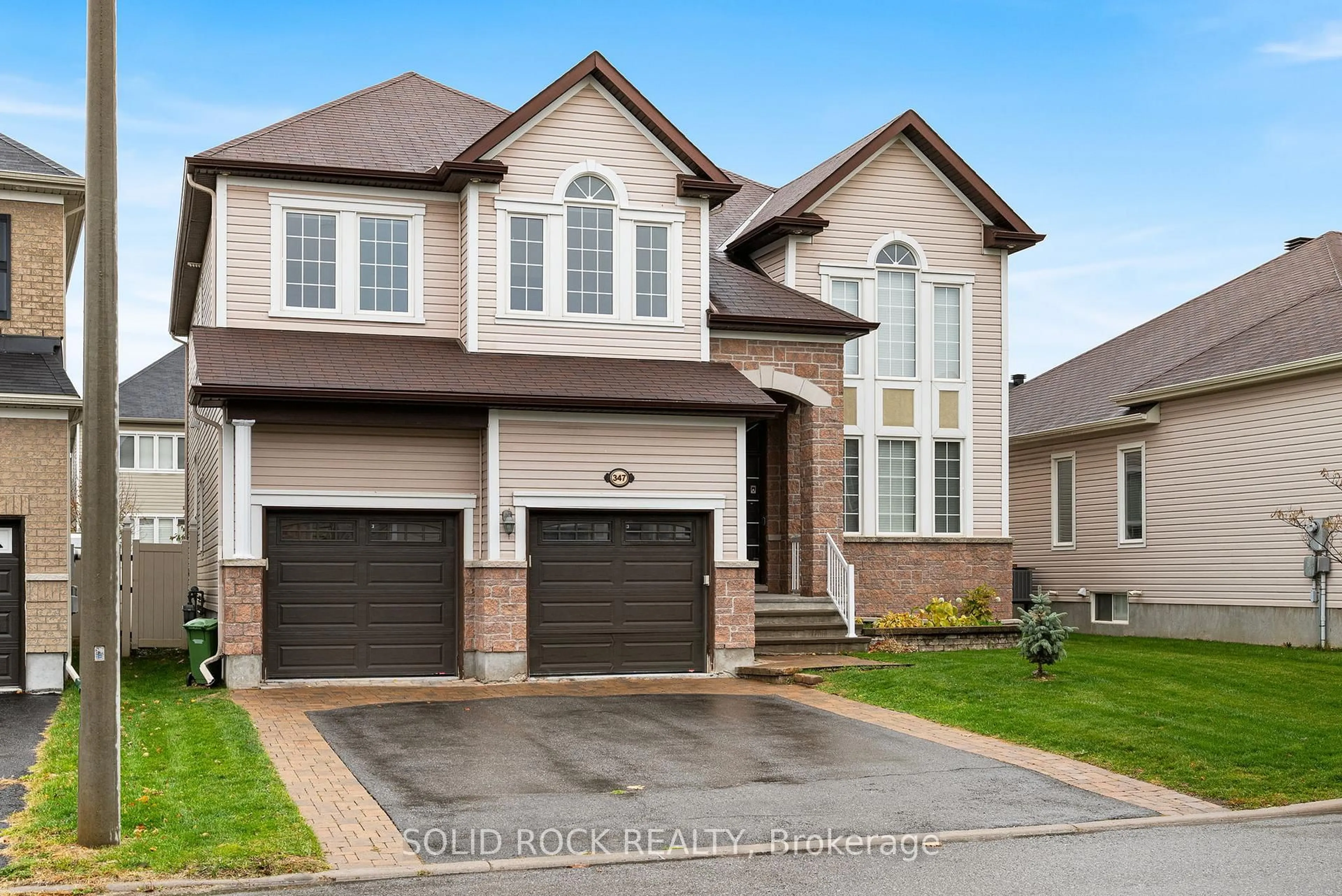 Home with brick exterior material, street for 347 Bamburgh Way, Ottawa Ontario K2J 5R1