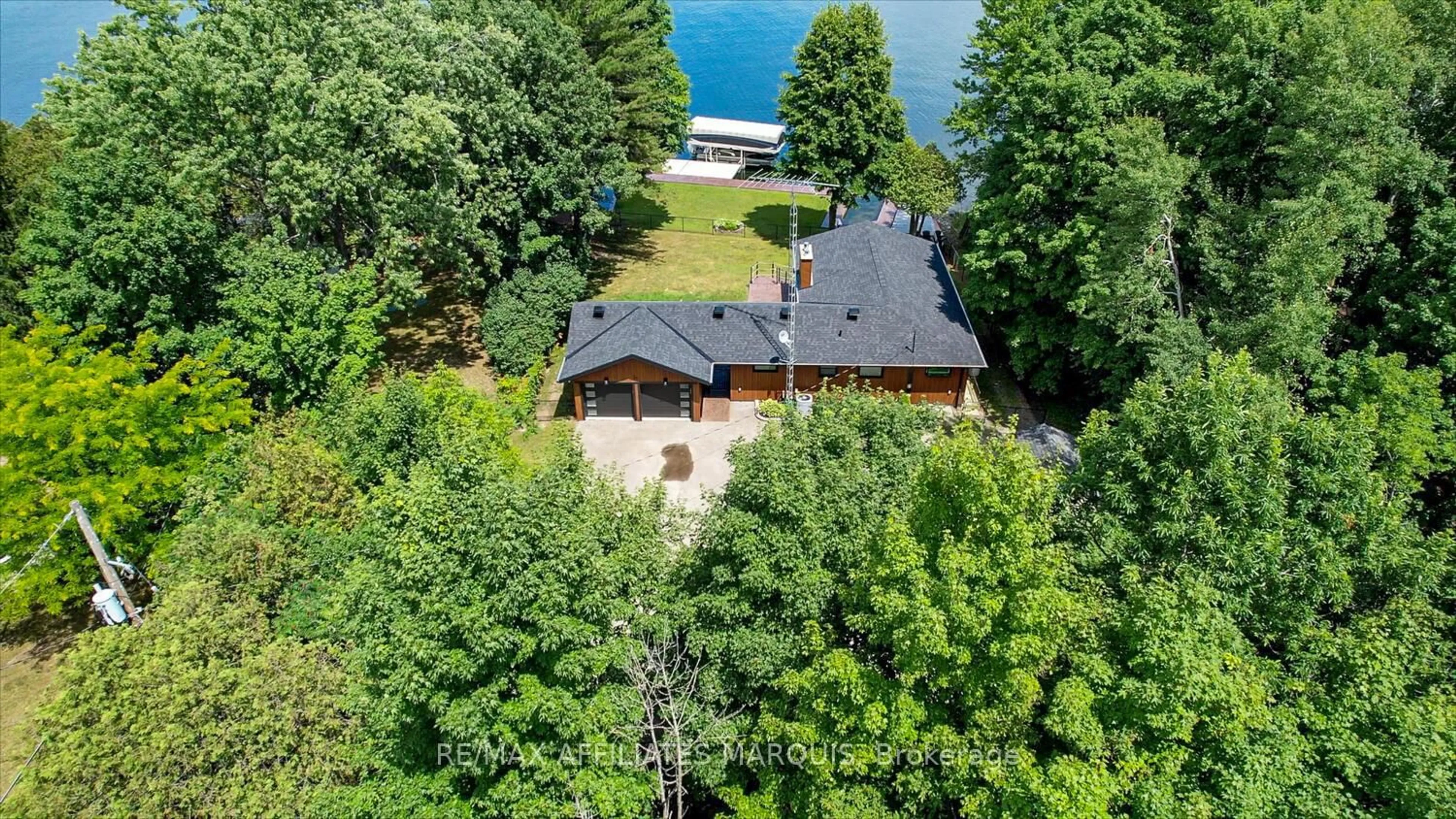 A pic from outside/outdoor area/front of a property/back of a property/a pic from drone, water/lake/river/ocean view for 34 R7 Rd, Rideau Lakes Ontario K0G 1L0