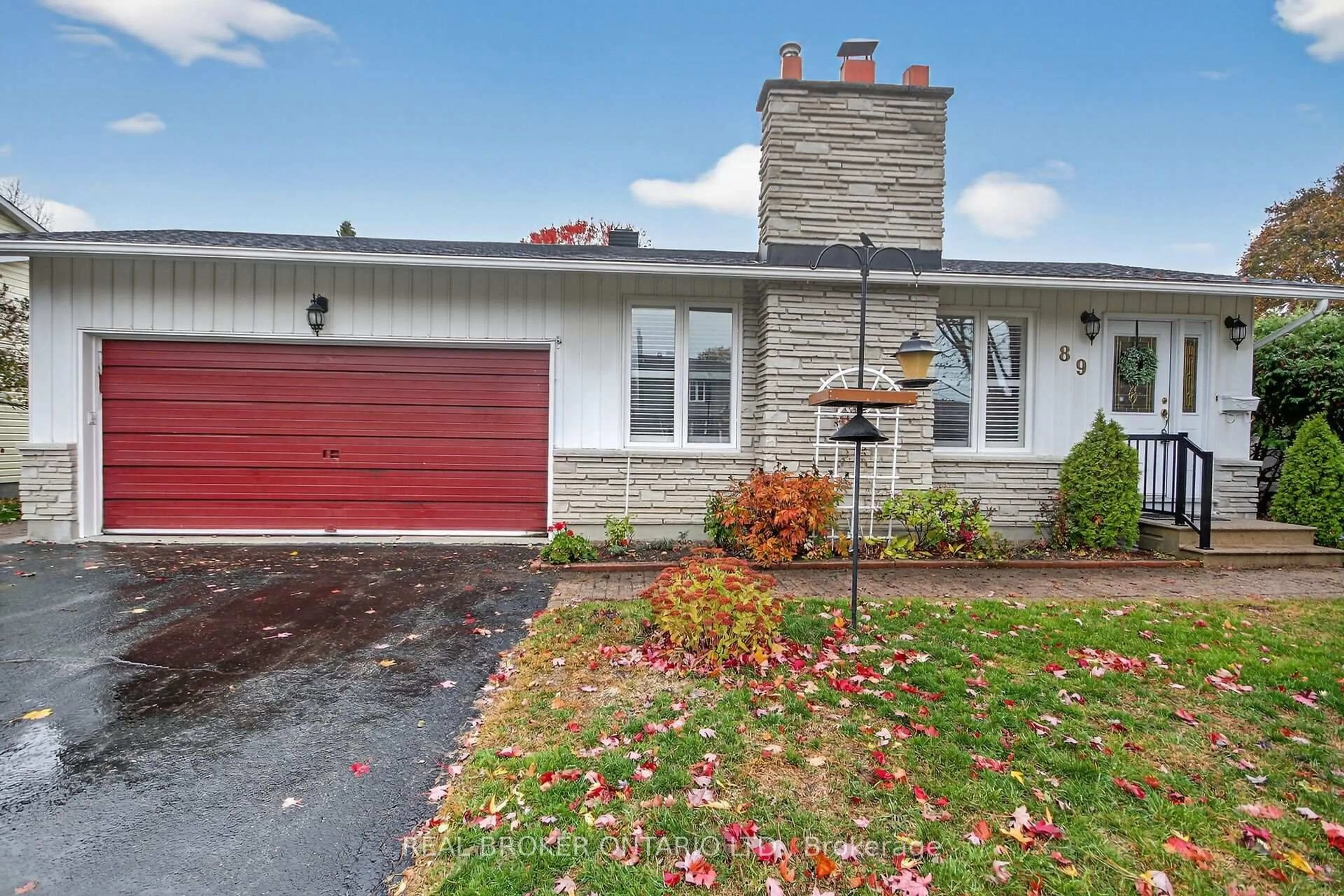 Home with brick exterior material, street for 89 Country Lane, Ottawa Ontario K2L 1J4