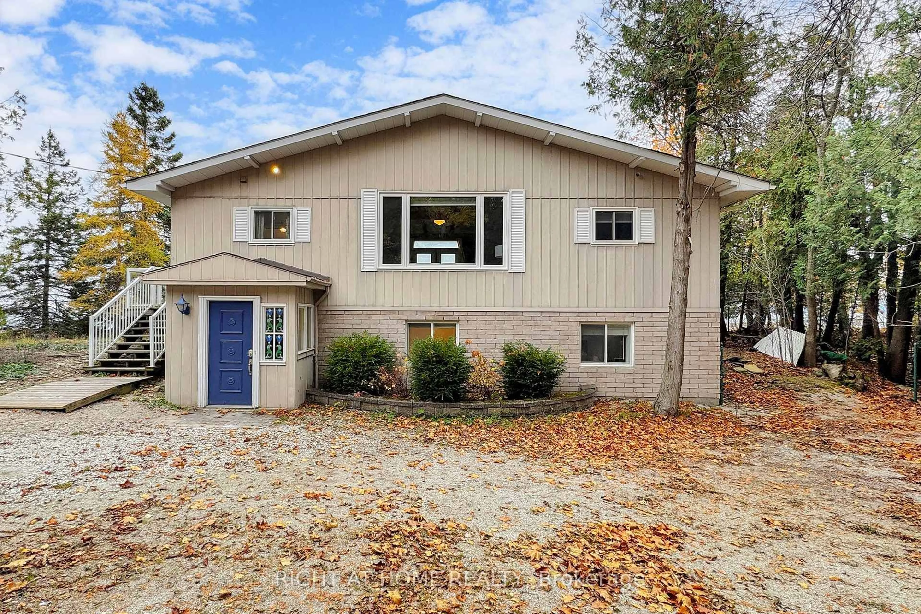 Home with vinyl exterior material, street for 505061 Grey Road 1 Rd, Georgian Bluffs Ontario N0H 2T0