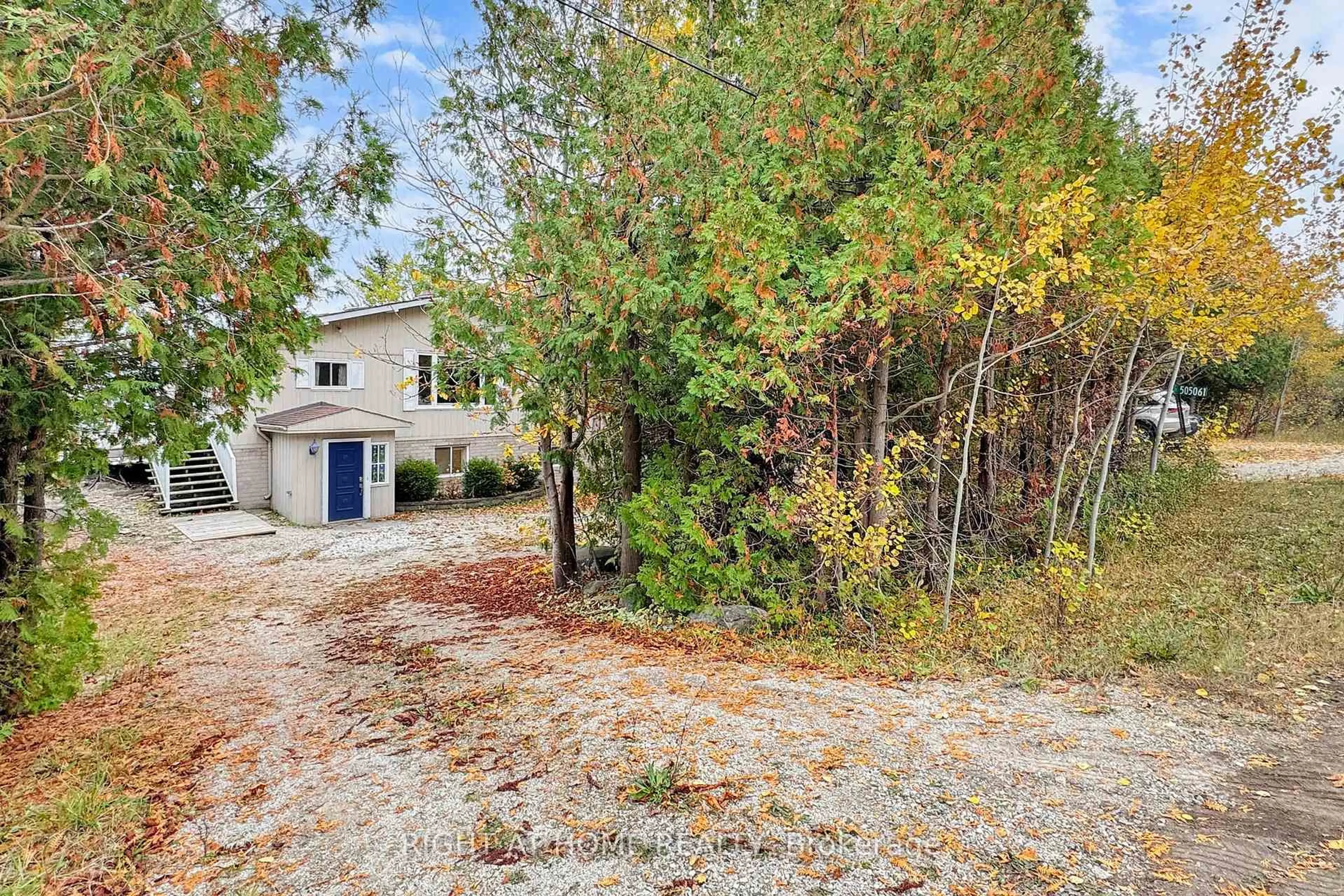 A pic from outside/outdoor area/front of a property/back of a property/a pic from drone, unknown for 505061 Grey Road 1 Rd, Georgian Bluffs Ontario N0H 2T0