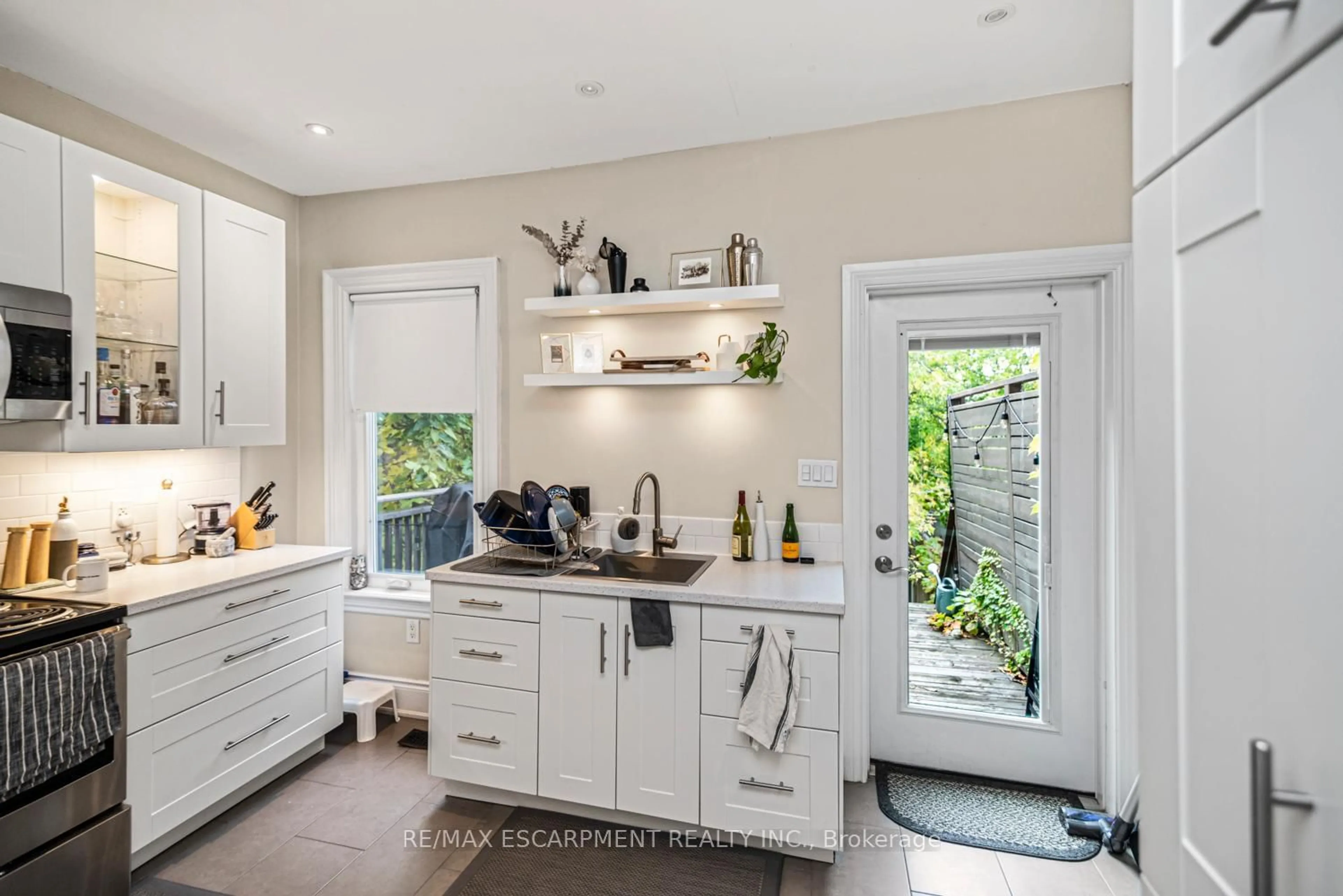 Contemporary kitchen, ceramic/tile floor for 319 Hunter St, Hamilton Ontario L8P 1S5