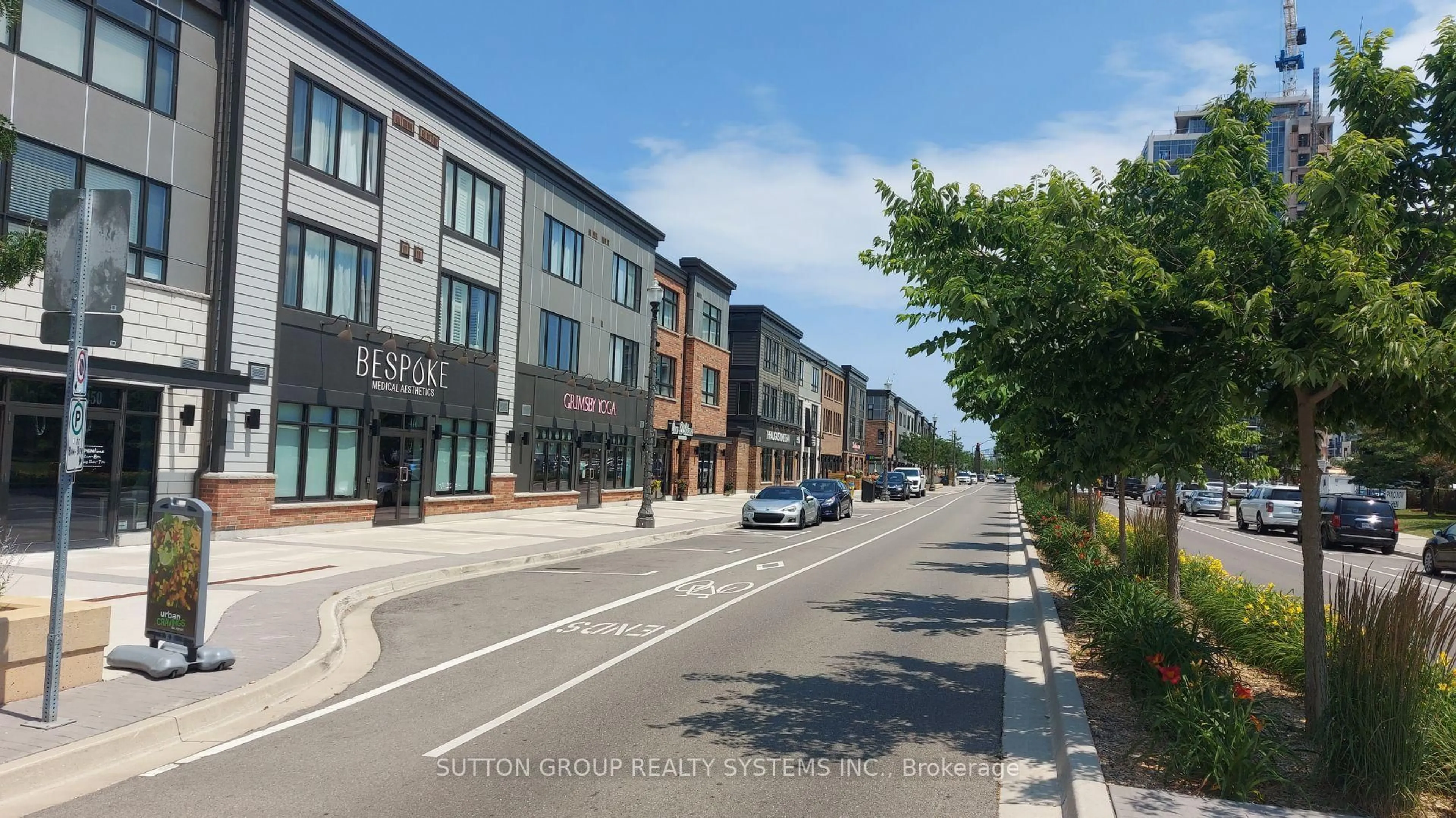 A pic from outside/outdoor area/front of a property/back of a property/a pic from drone, street for 520 North Service Rd #409, Grimsby Ontario L3M 0C9