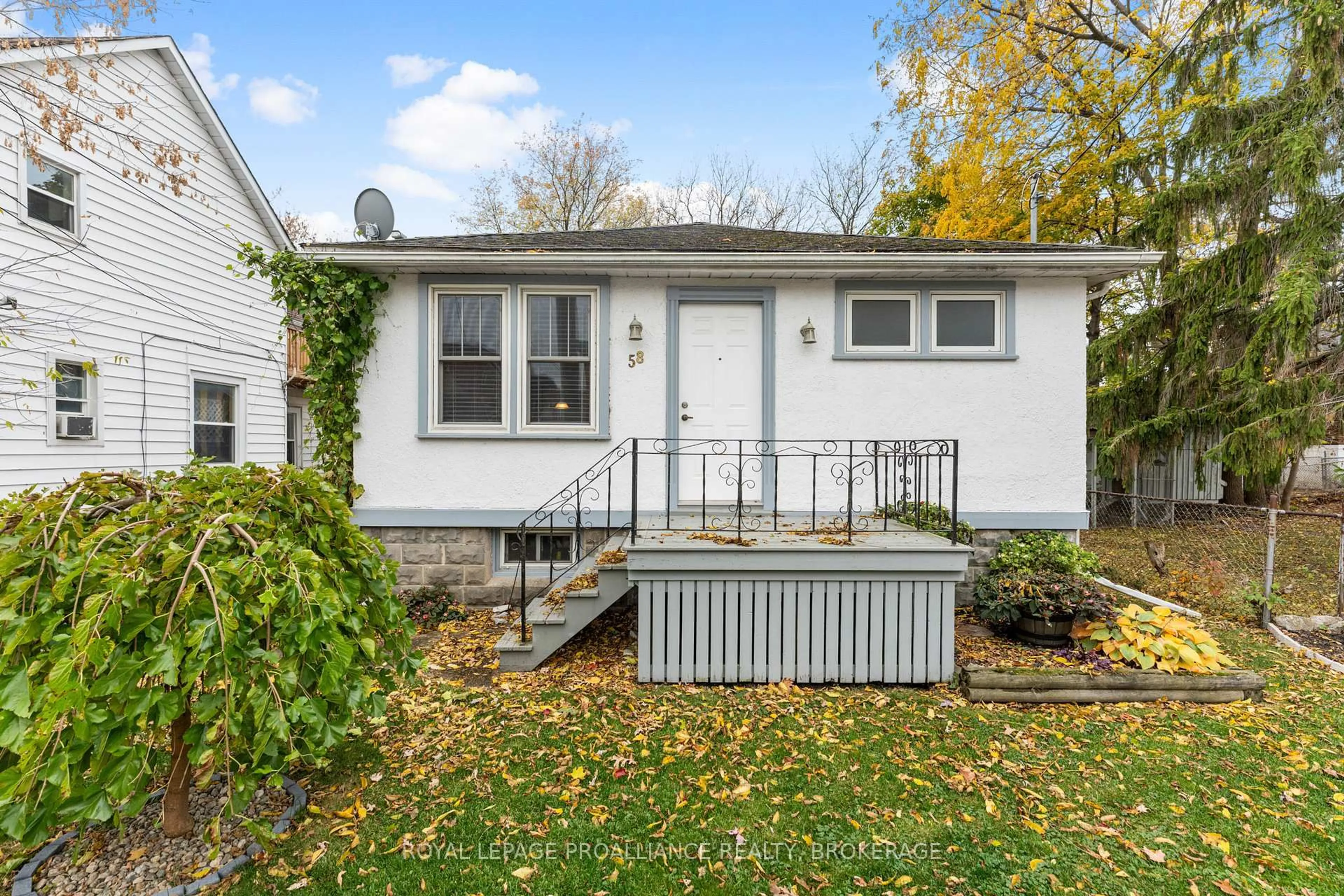 Home with vinyl exterior material, street for 58 Stanley St, Kingston Ontario K7K 1Y1